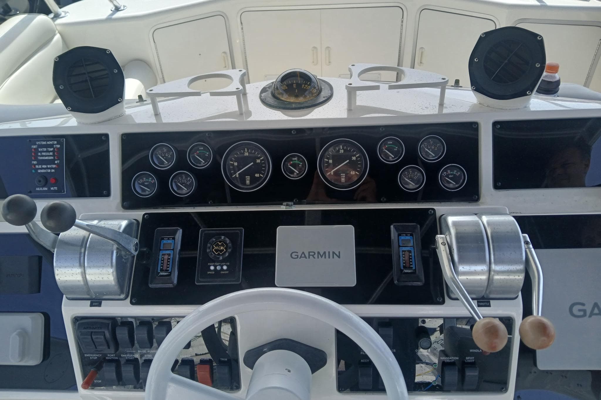 Control panel of a 1996 Sea Ray 550 Sedan Bridge with Garmin navigation system.