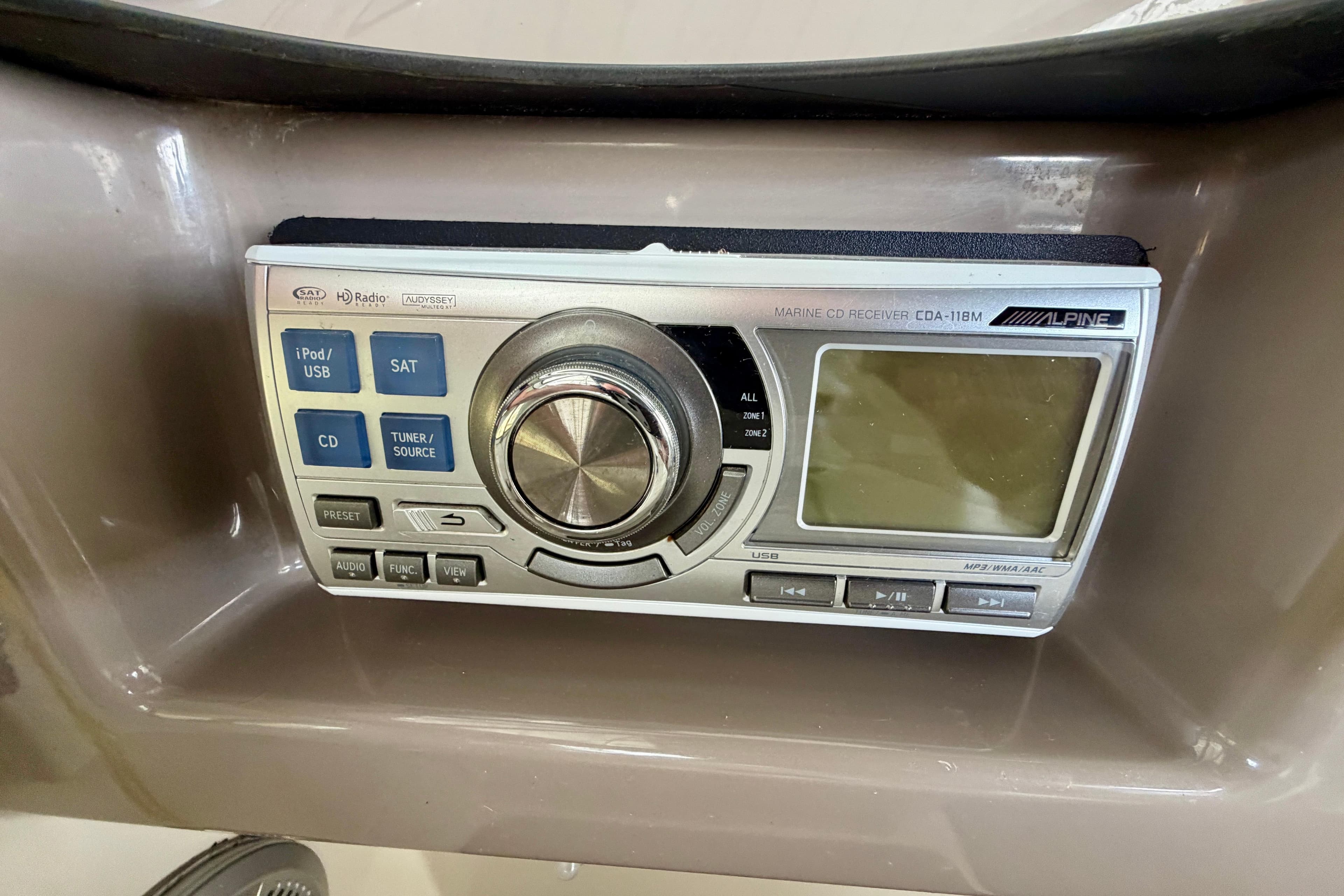 Alpine marine CD receiver in a 2000 Carver 396 Motor Yacht dashboard.