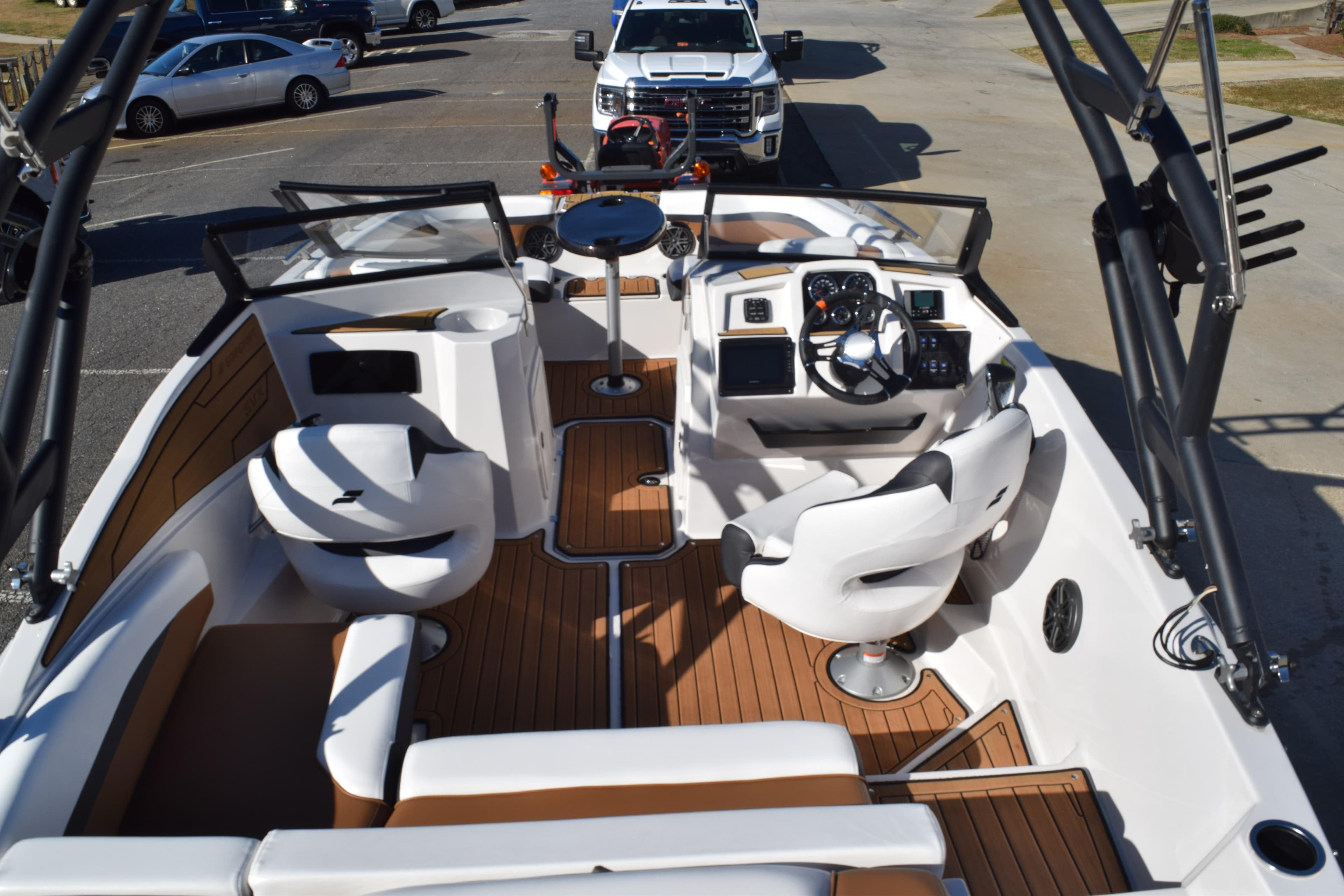 2023 Starcraft SVX 210 IO boat interior with modern seating and dashboard.