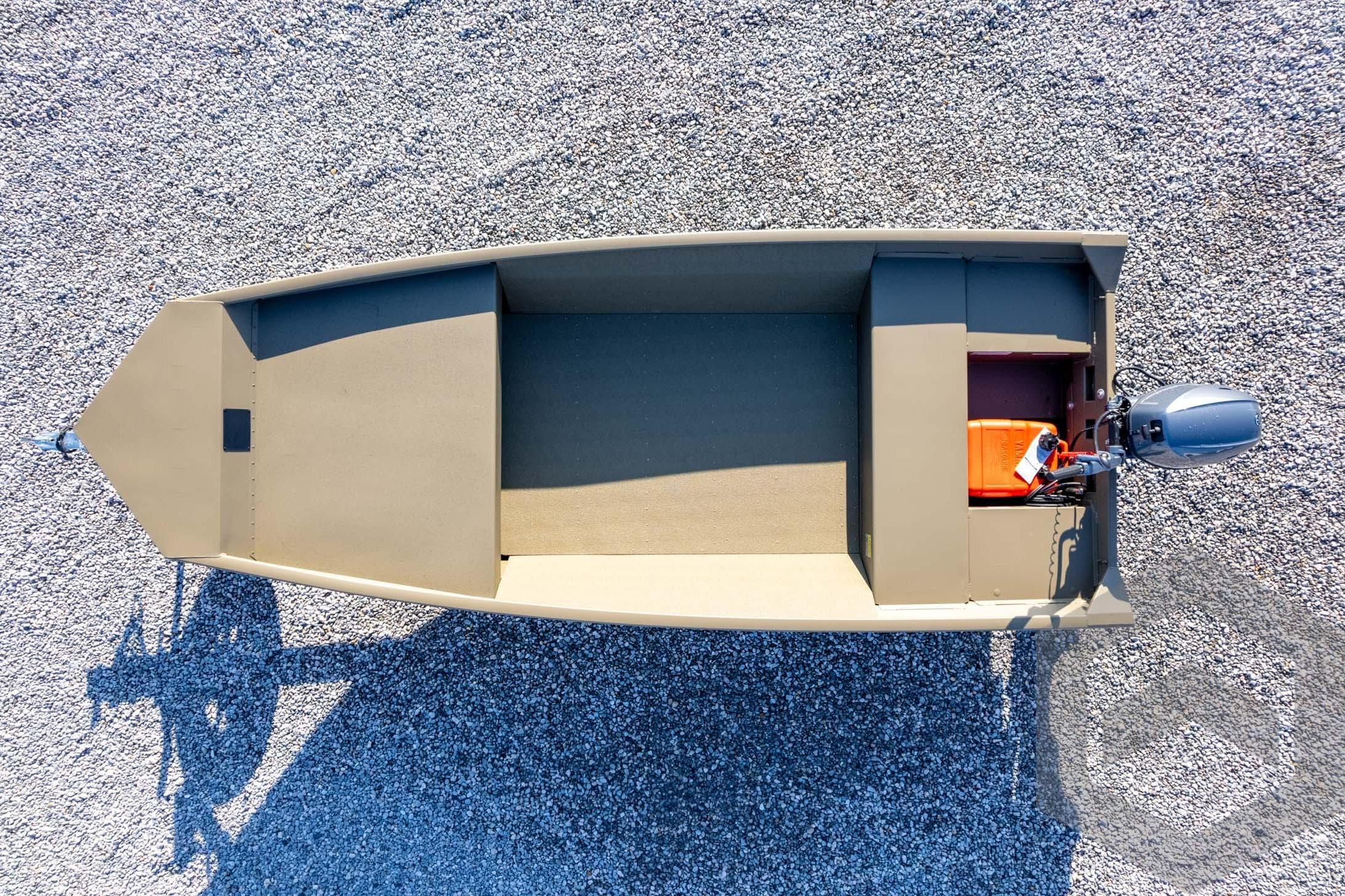 Top view of 2026 G3 Gator Tough 1548 VBW boat on gravel surface.