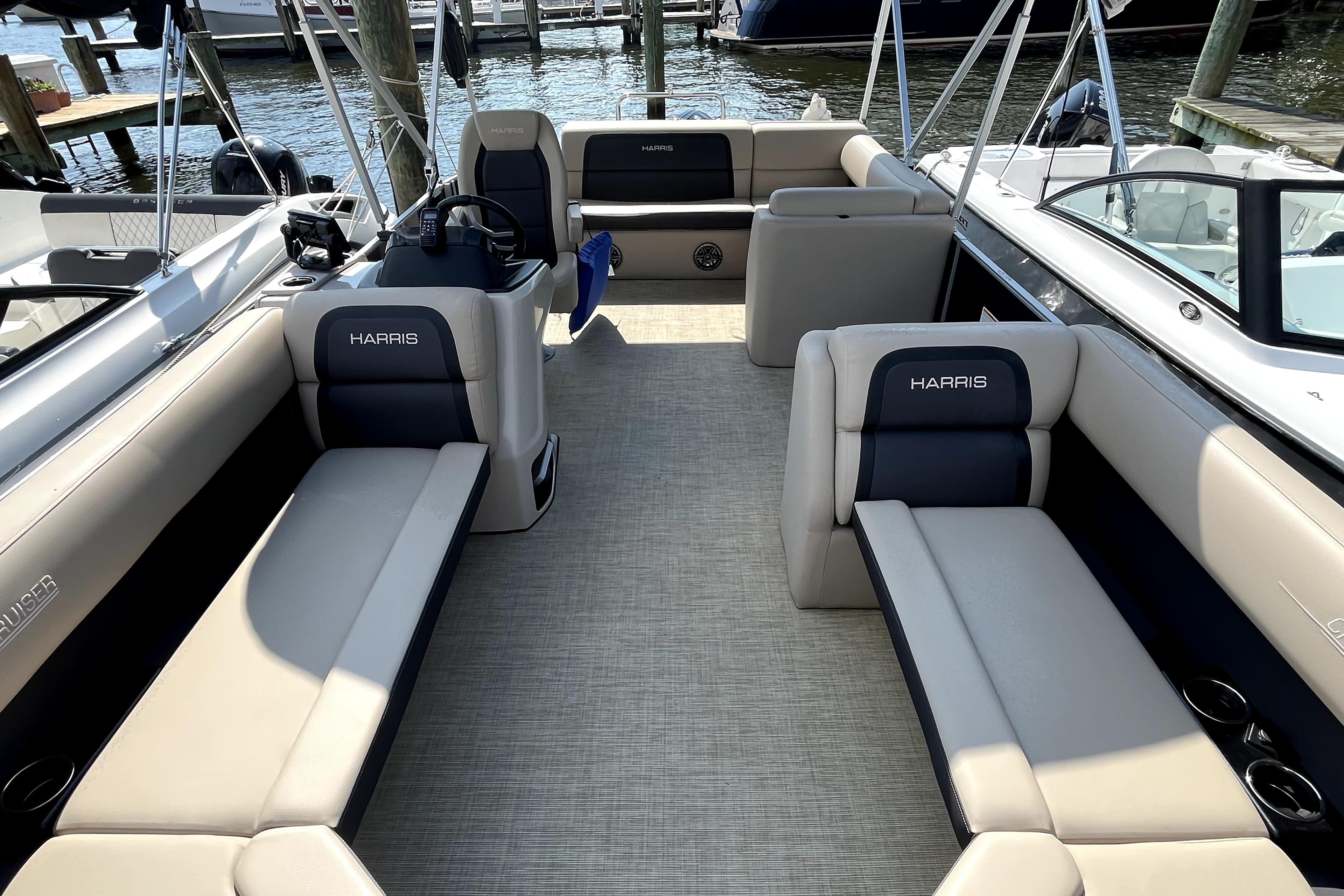 2025 Harris HCX23 boat interior with spacious seating and modern design.