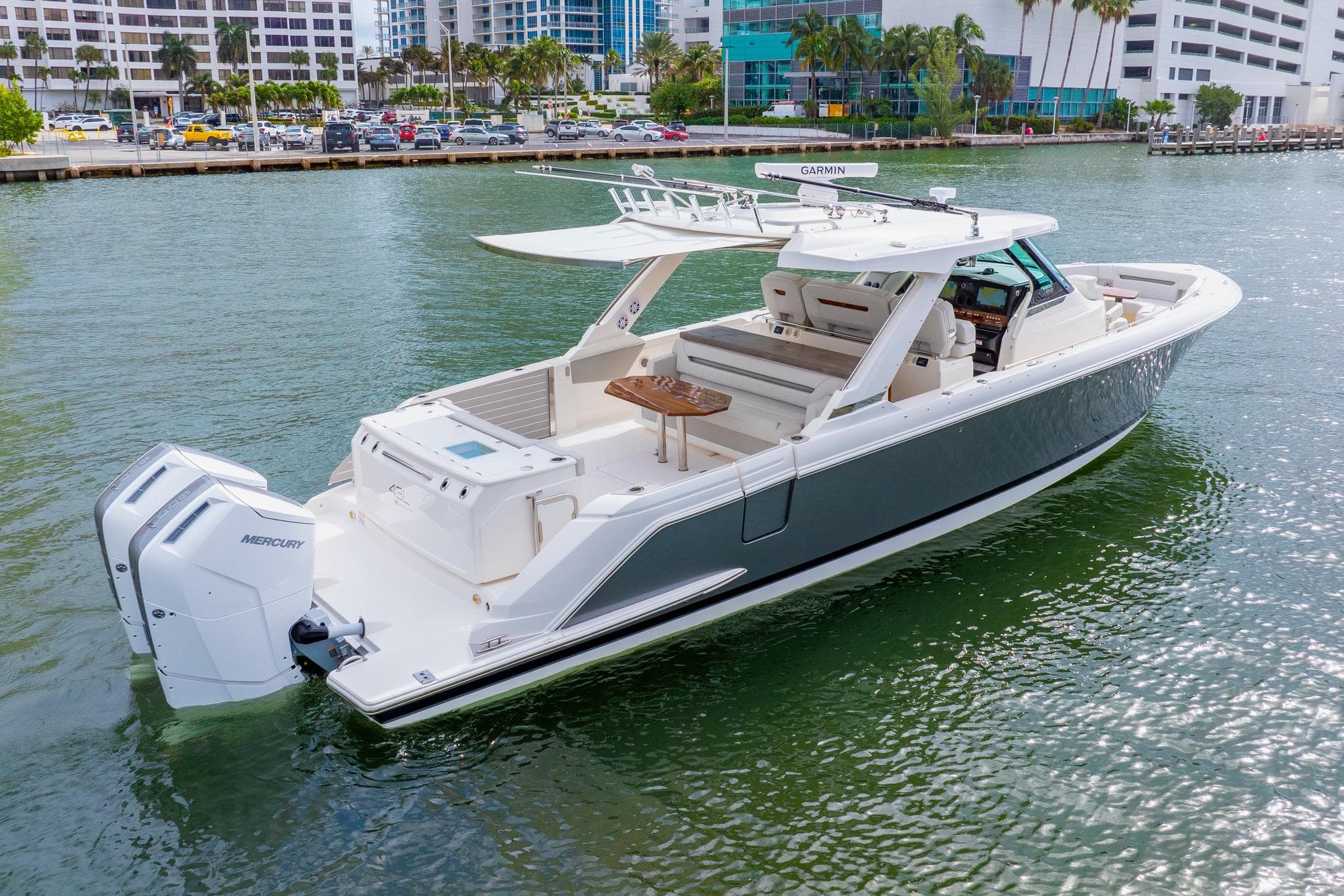 2024 Tiara Yachts 43 LS luxury boat on water, featuring sleek design and powerful engines.
