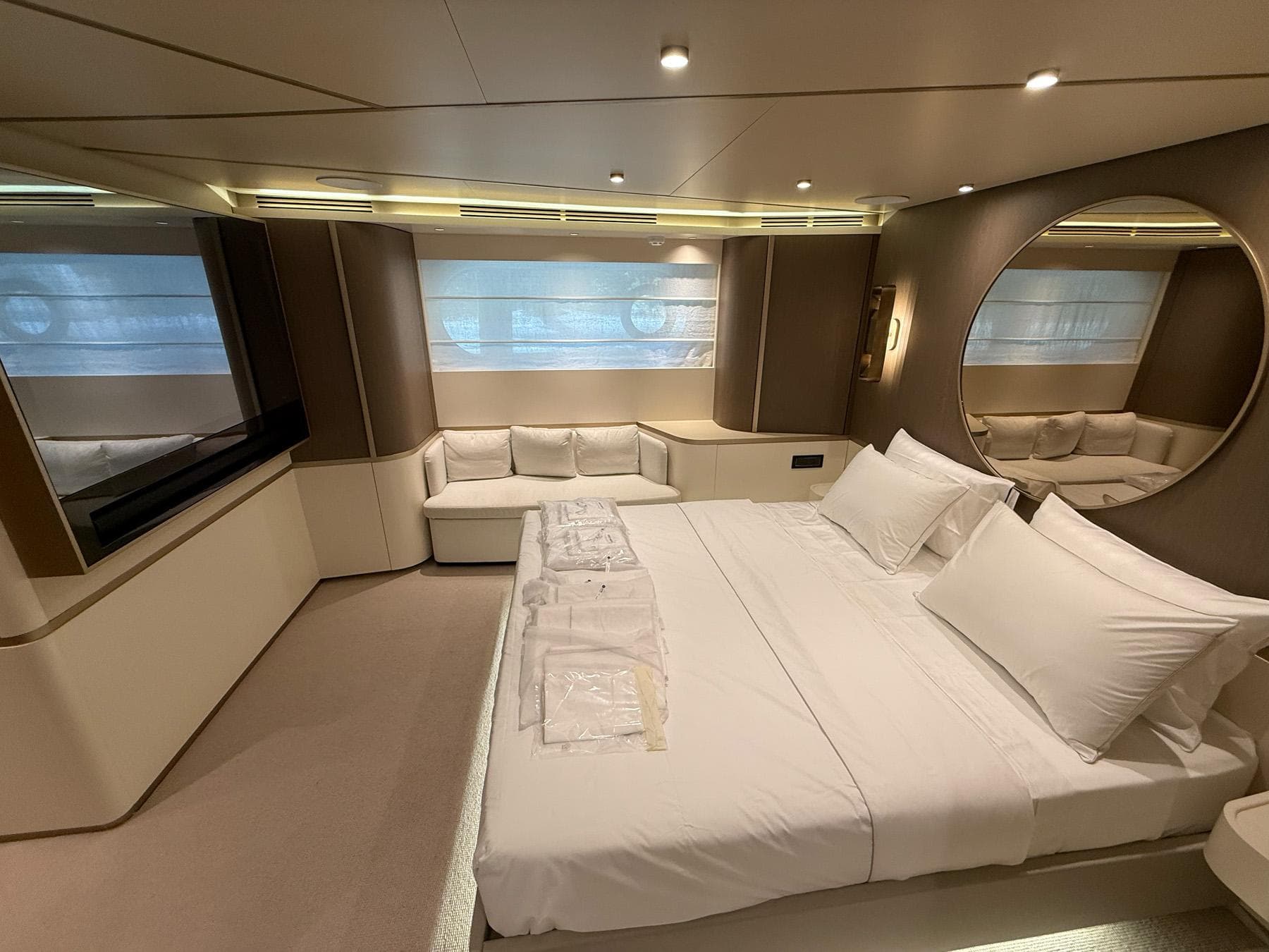Luxurious bedroom interior of 2026 Azimut Magellano 25M yacht with modern design and elegant furnishings.