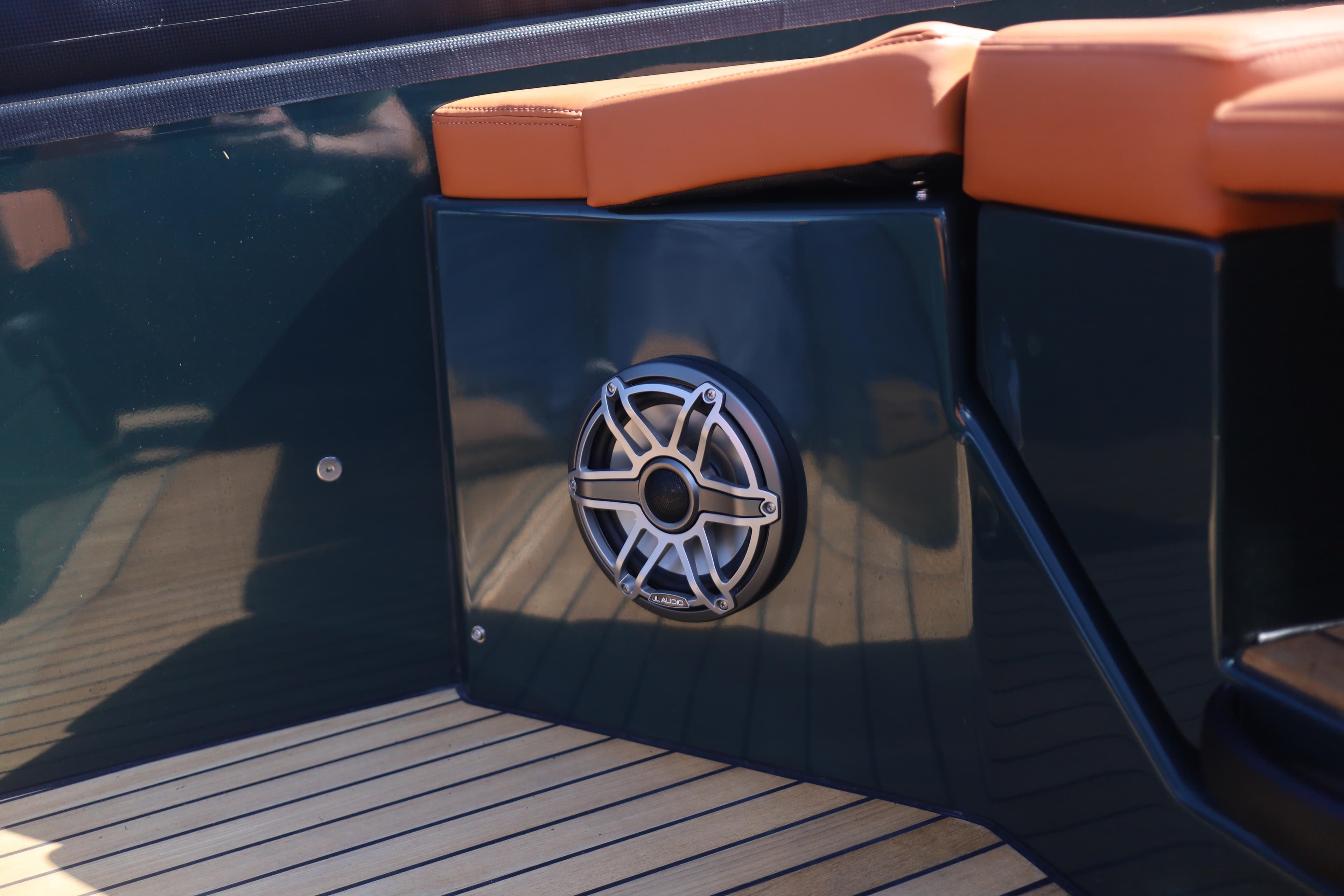 2025 Skipper-BSK 38 boat interior with speaker and cushioned seating.