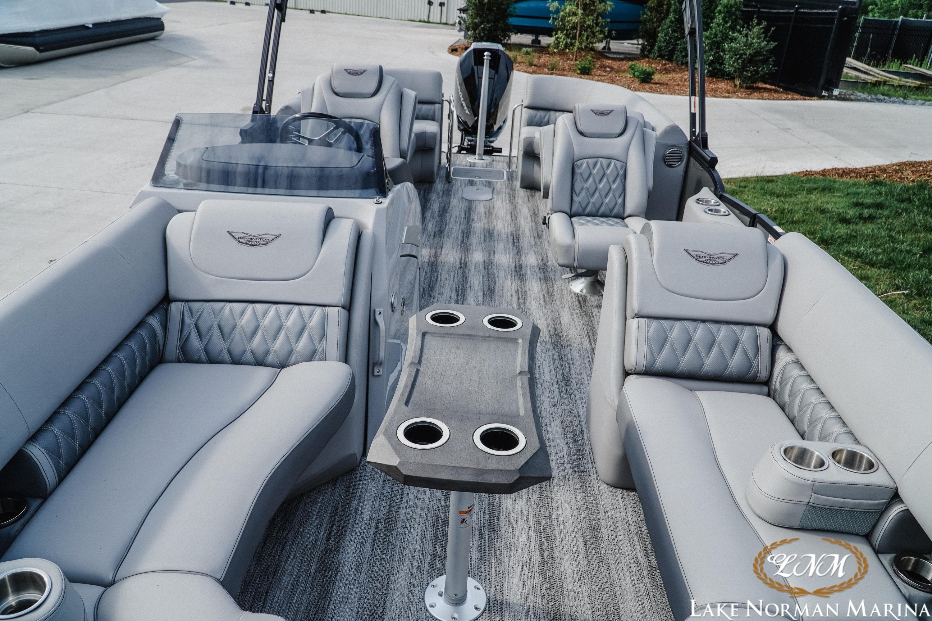 2026 Bennington 24LXSFB pontoon boat with luxurious seating and modern design at Lake Norman Marina.
