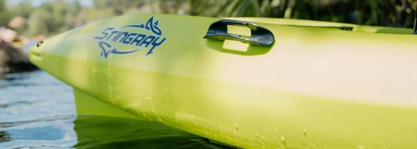 2023 Liquidlogic Stingray 11.5 kayak in bright green on water.