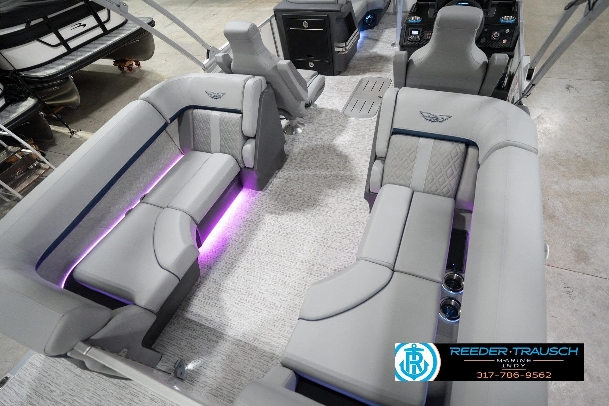 2026 Bennington 22 MFB boat interior with luxurious seating and ambient lighting.