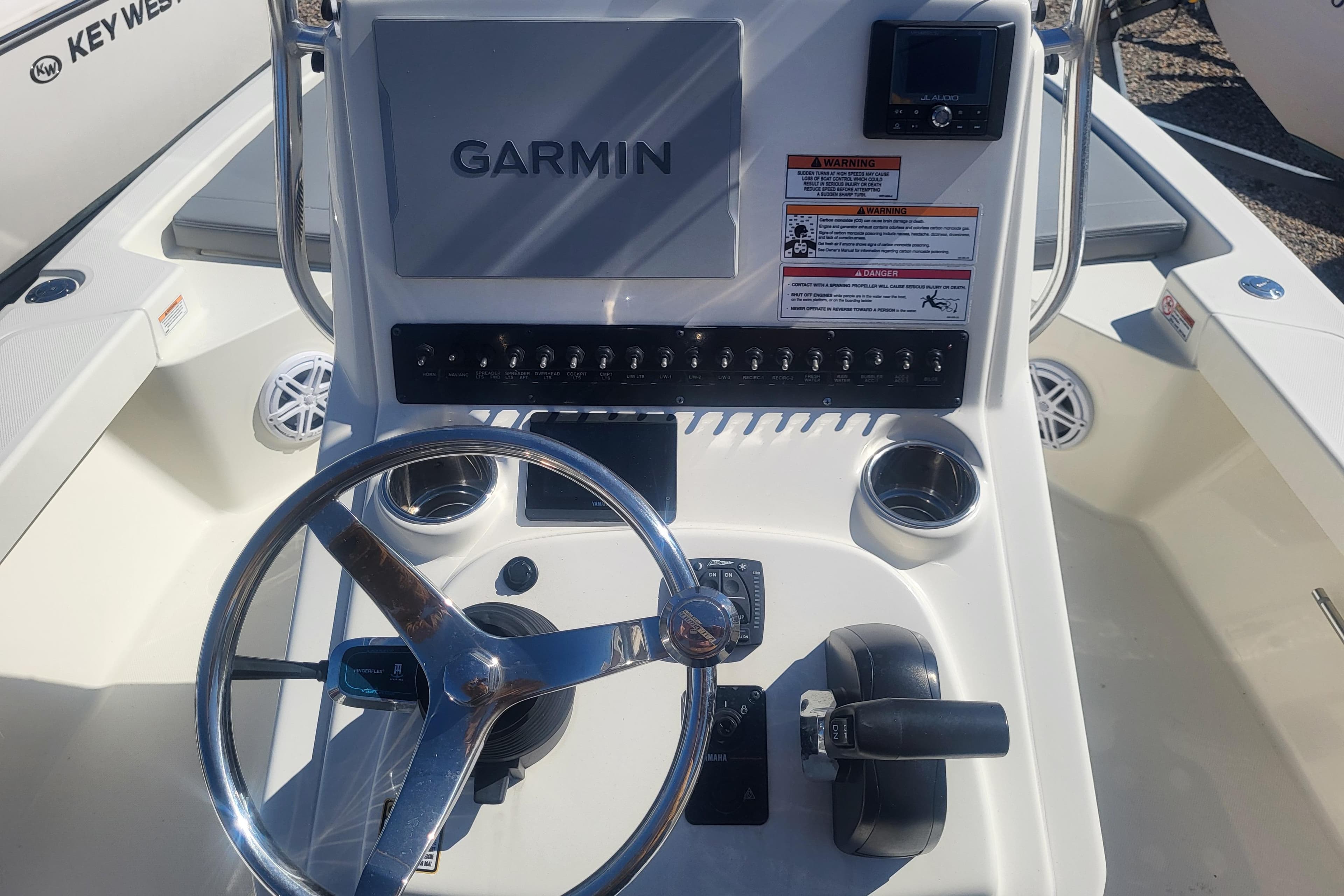 2024 Pathfinder 2200 TRS boat console with Garmin display and steering wheel.