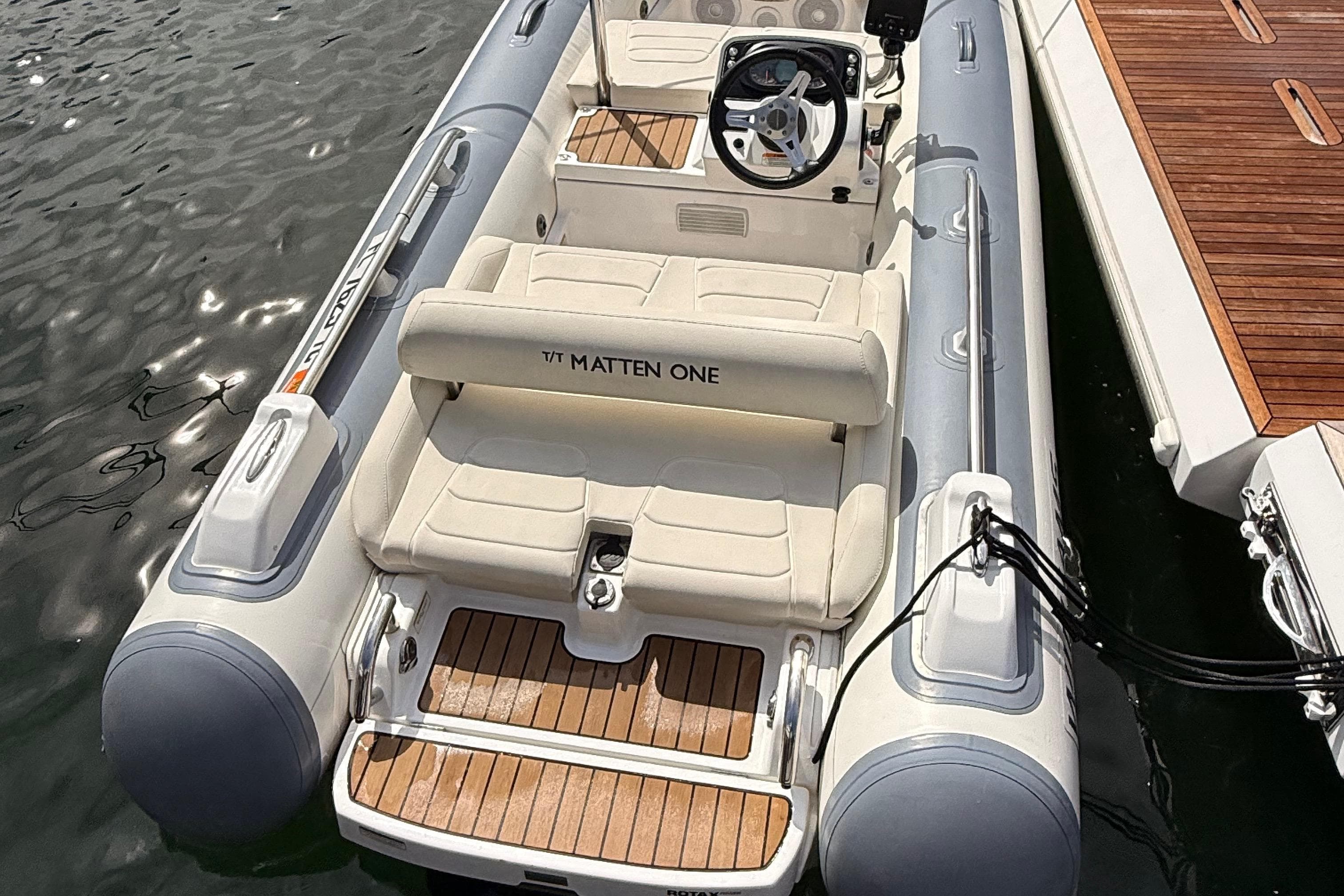 2021 Williams Jet Tenders SportJet 395 docked, featuring sleek design and comfortable seating.