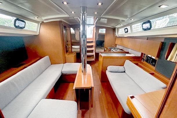 Interior of 2017 Beneteau Oceanis 41.1 yacht with modern wood finish and seating.