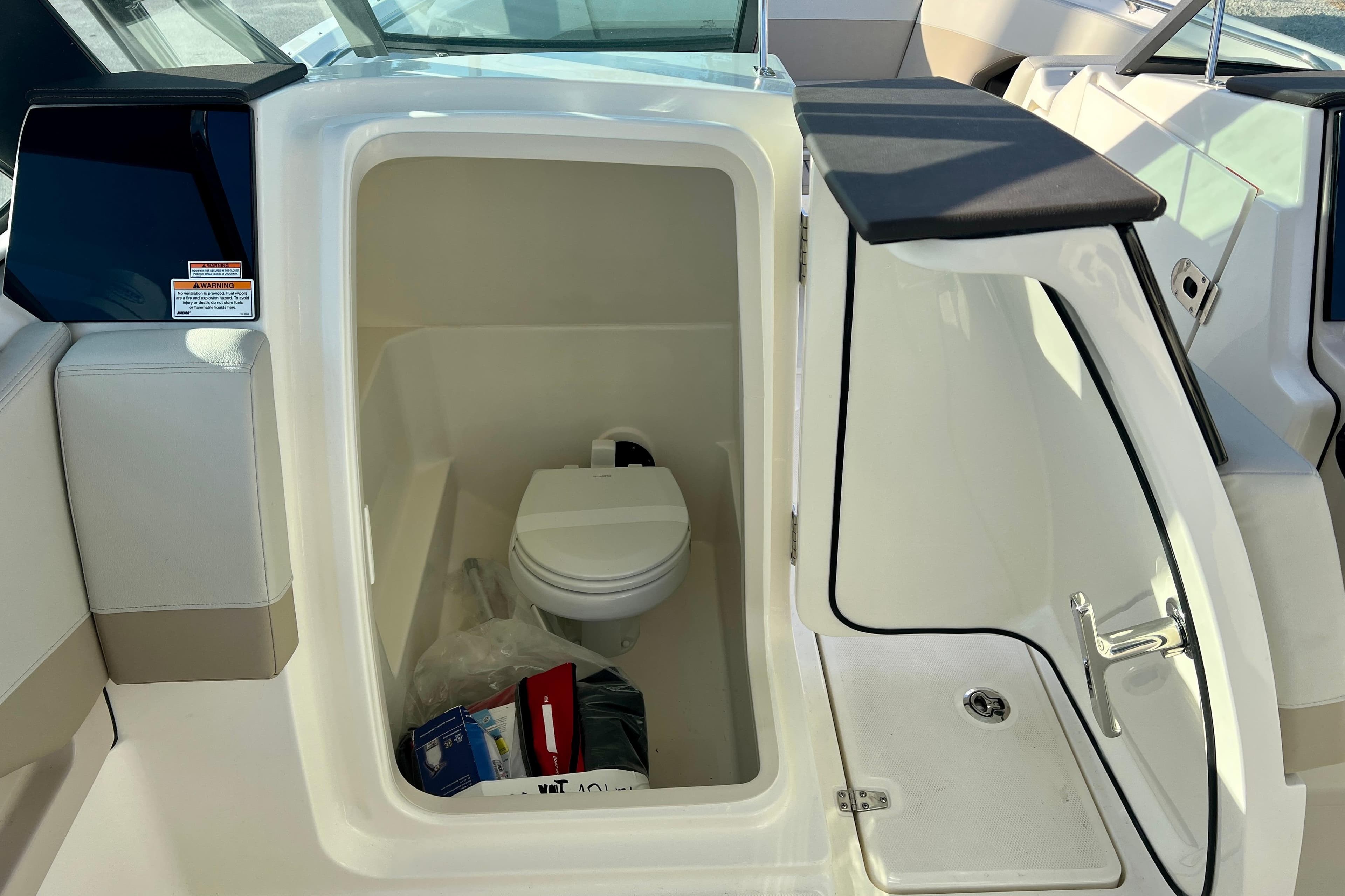 Interior of 2025 Boston Whaler 240 Vantage featuring a toilet.