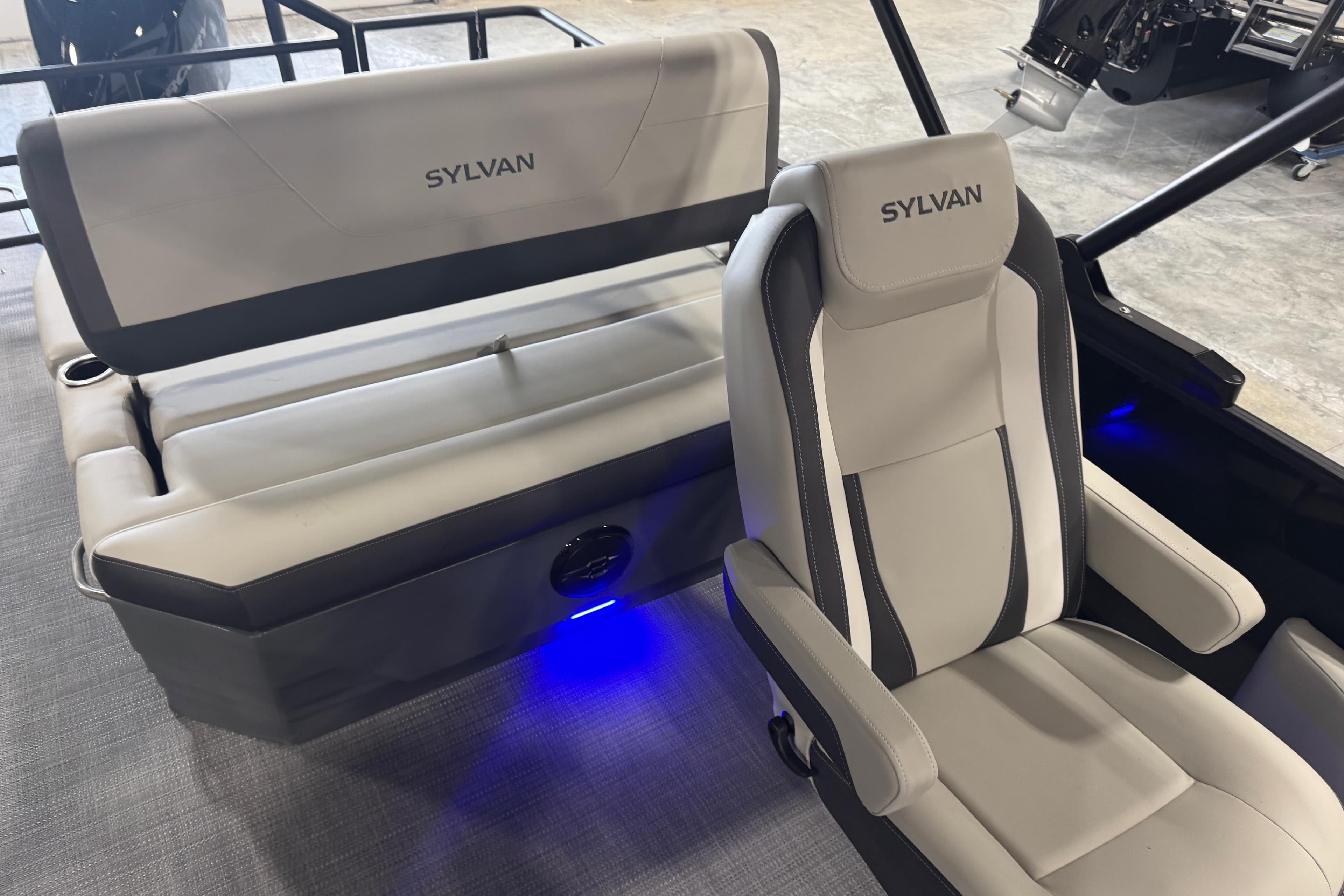 2026 Sylvan X5 boat interior with modern seating and ambient lighting.