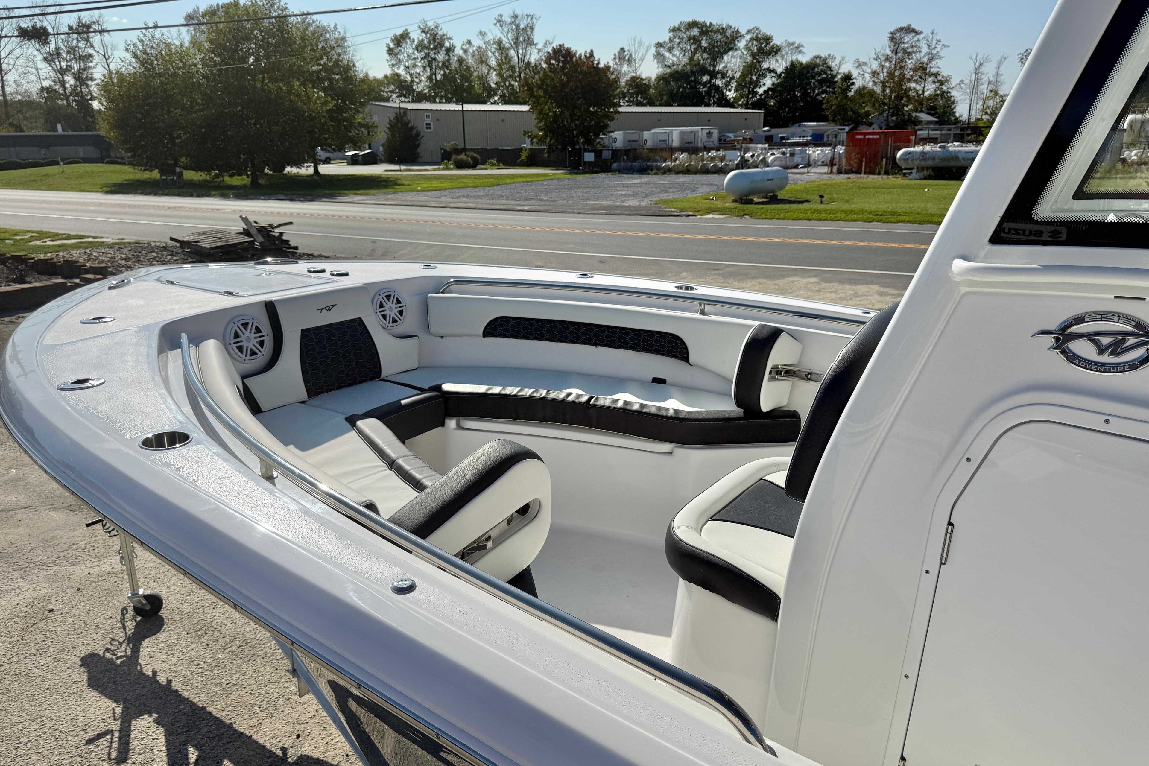 2026 Tidewater 232 CC Adventure boat with sleek seating and modern design.