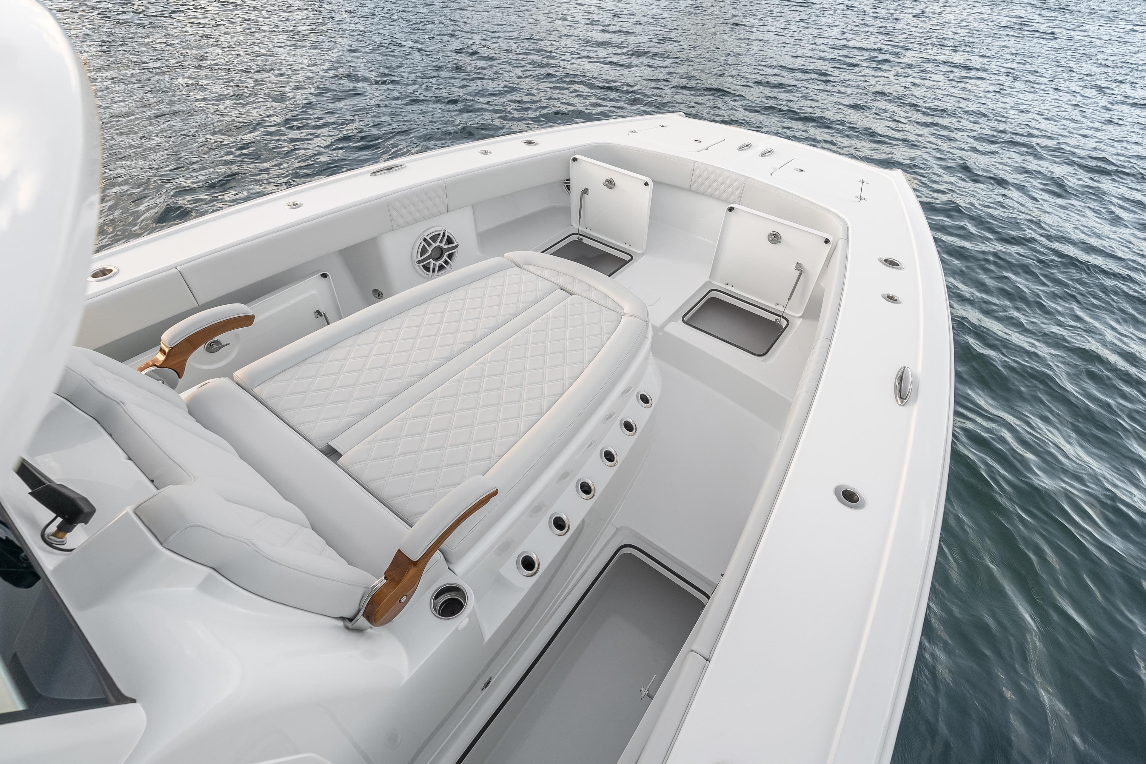 2026 Freeman 38 boat interior with luxurious seating on calm water.