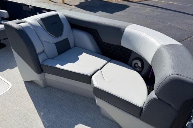 Luxurious seating on 2026 Alera M 23Q boat, featuring modern design and comfort.