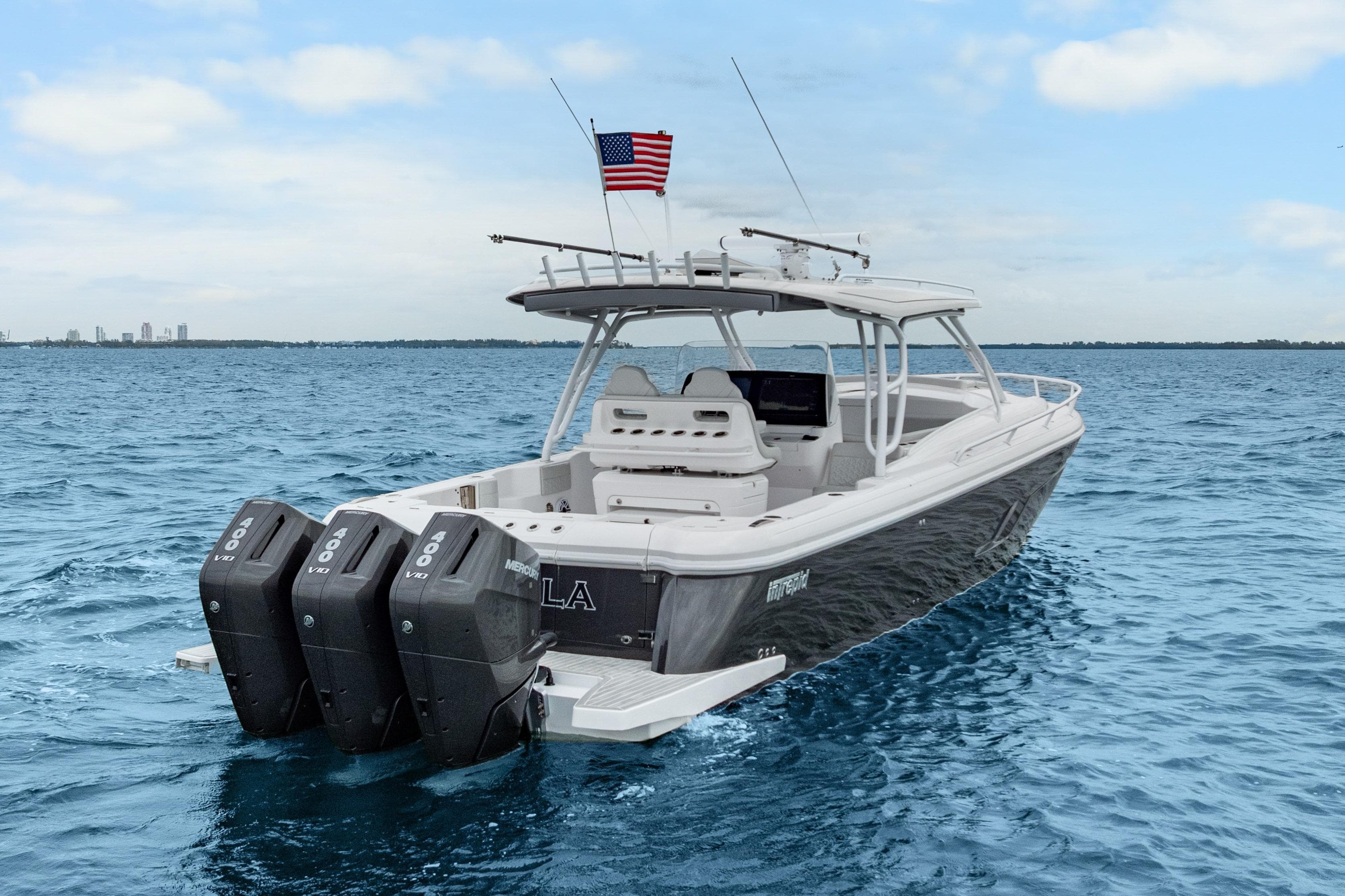 2024 Intrepid 41 Valor boat with triple Mercury engines on open water.