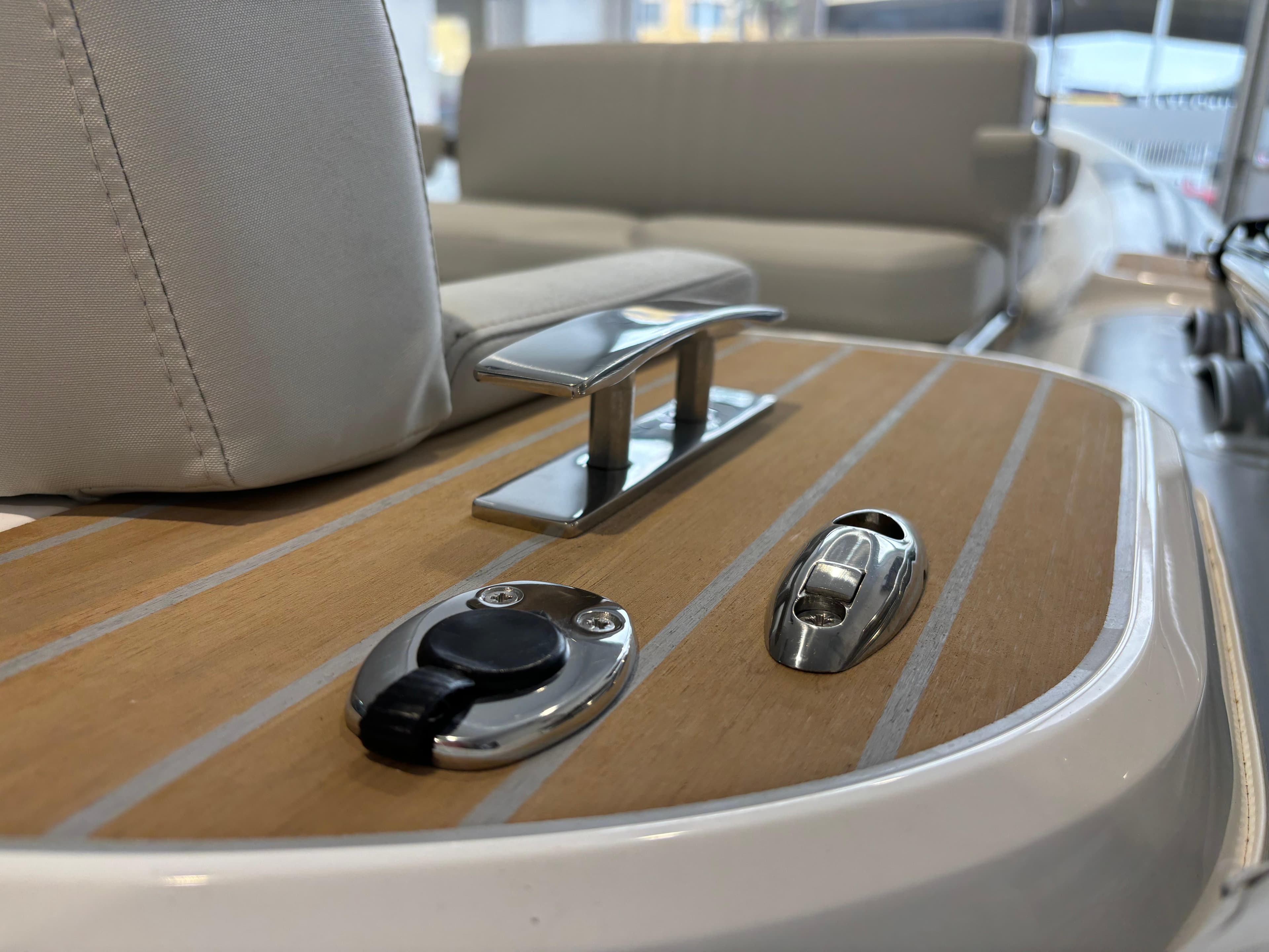 2024 Williams Jet Tenders DieselJet 445, teak deck detail with cleat and fittings.
