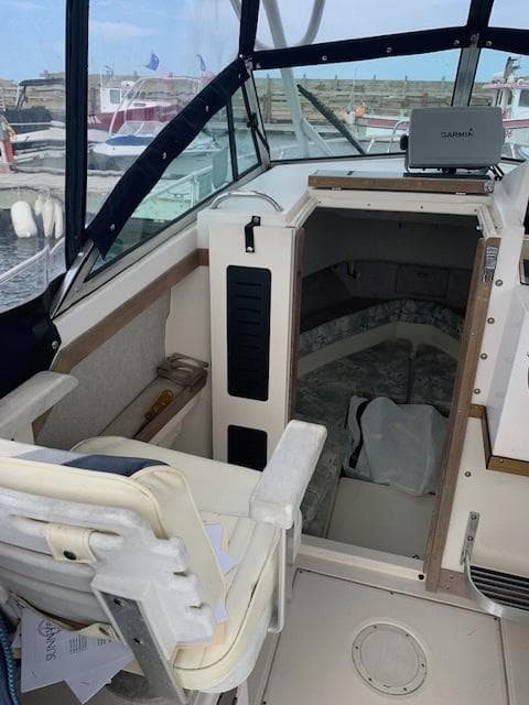 1994 Grady-White Seafarer 22 boat interior with seating and cabin view.