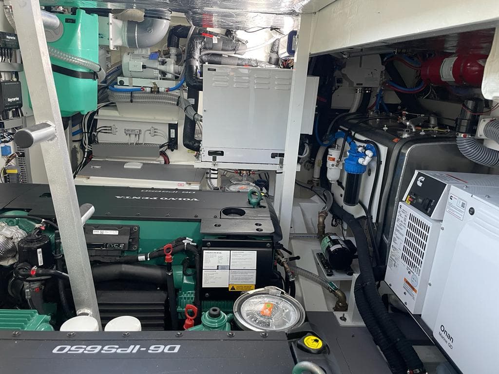 Engine room of a 2022 Prestige 520 yacht with modern equipment.