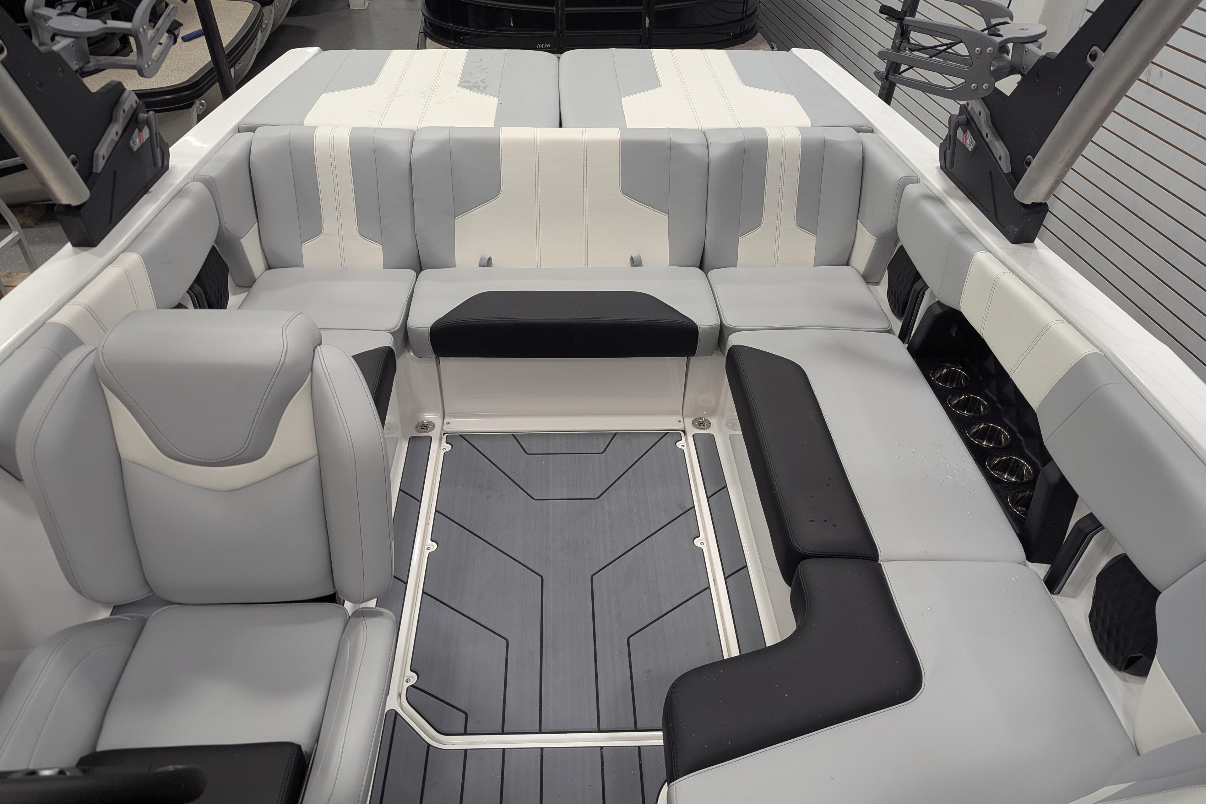 2026 Malibu Wakesetter 21 LX interior with sleek gray and white seating design.