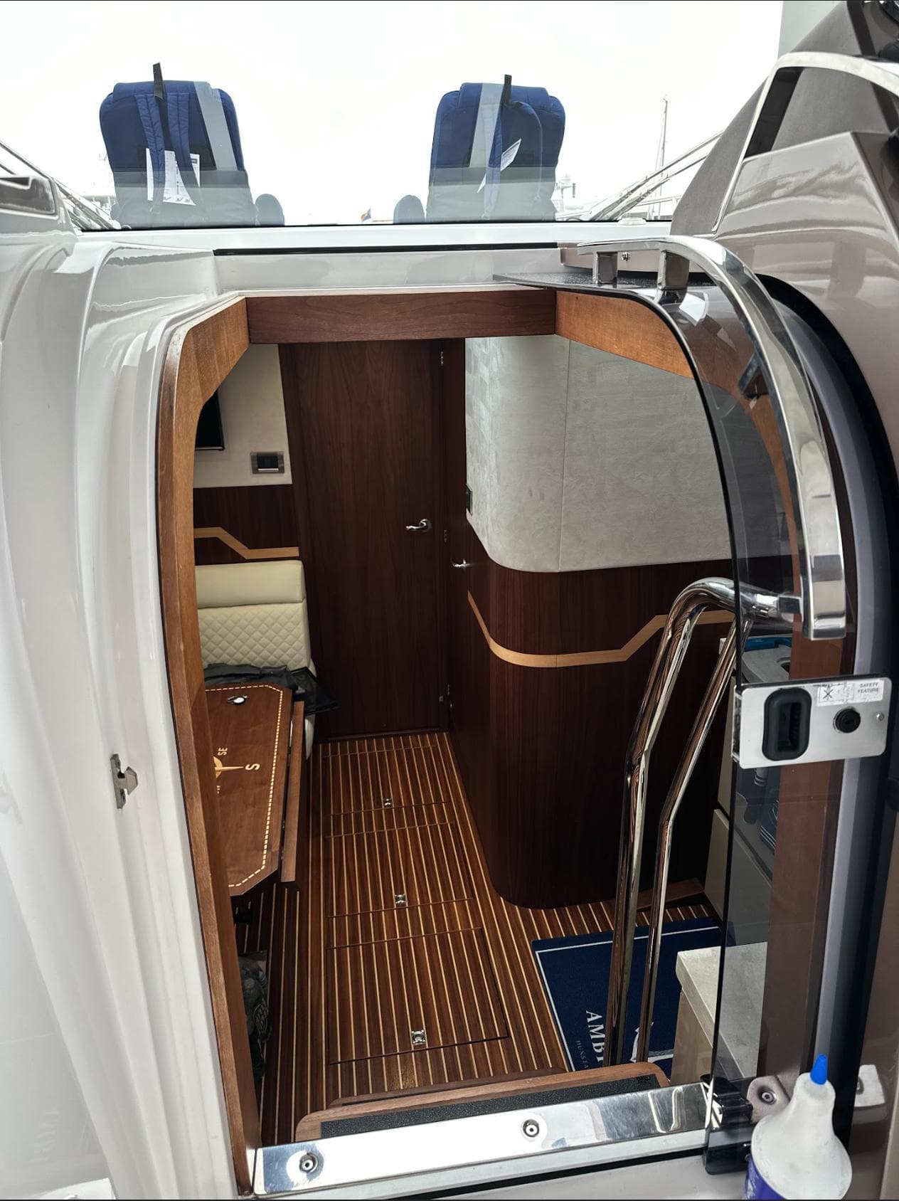 Interior view of 2018 Galeon 385 HTS yacht, featuring sleek wood finishes and modern design.