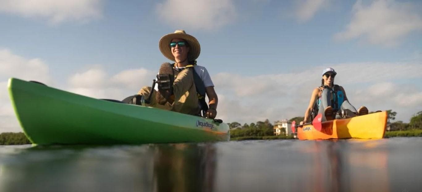 Two people kayaking on Liquidlogic Manta Ray Propel 12 kayaks, 2023 model.