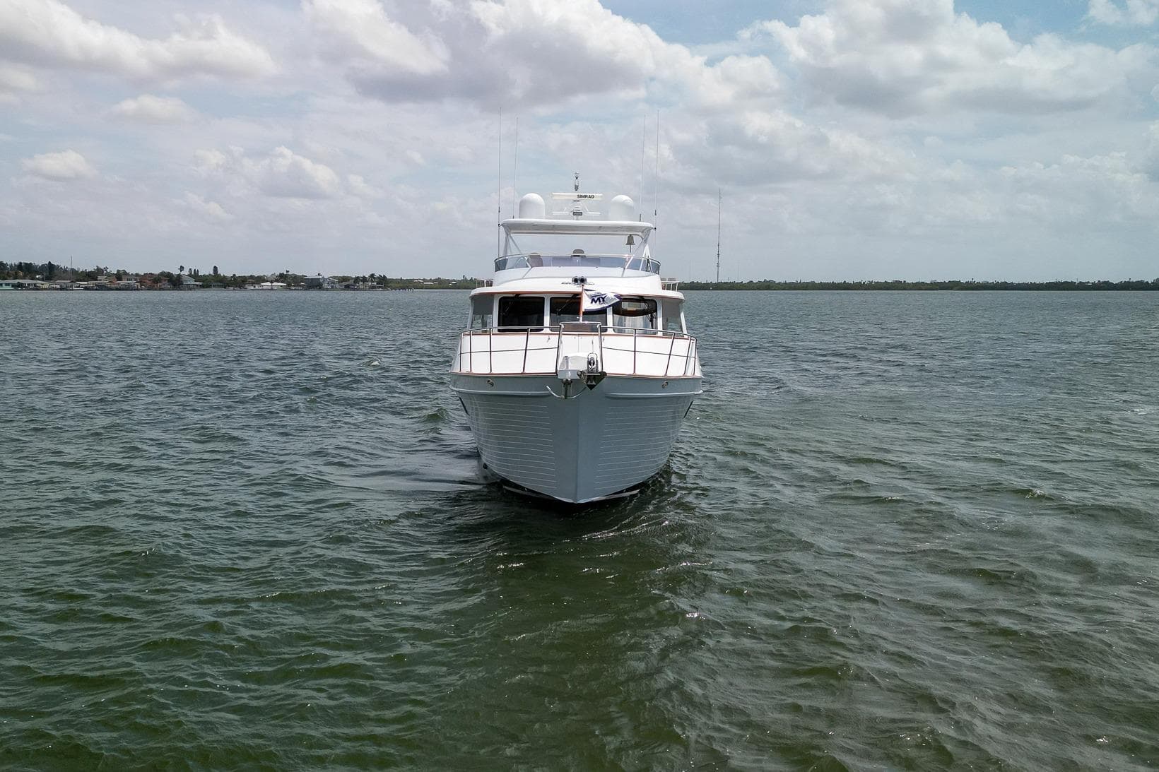2015 Marlow Explorer 49E yacht cruising on open water under cloudy skies.
