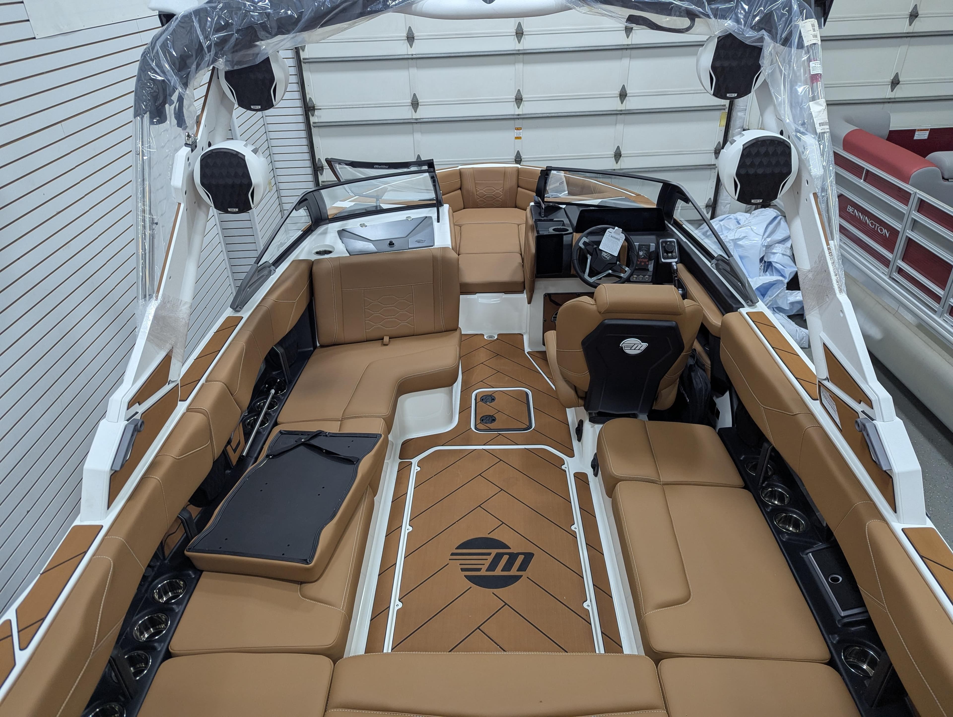 2026 Malibu 23 LSV boat interior with tan seating and modern design.