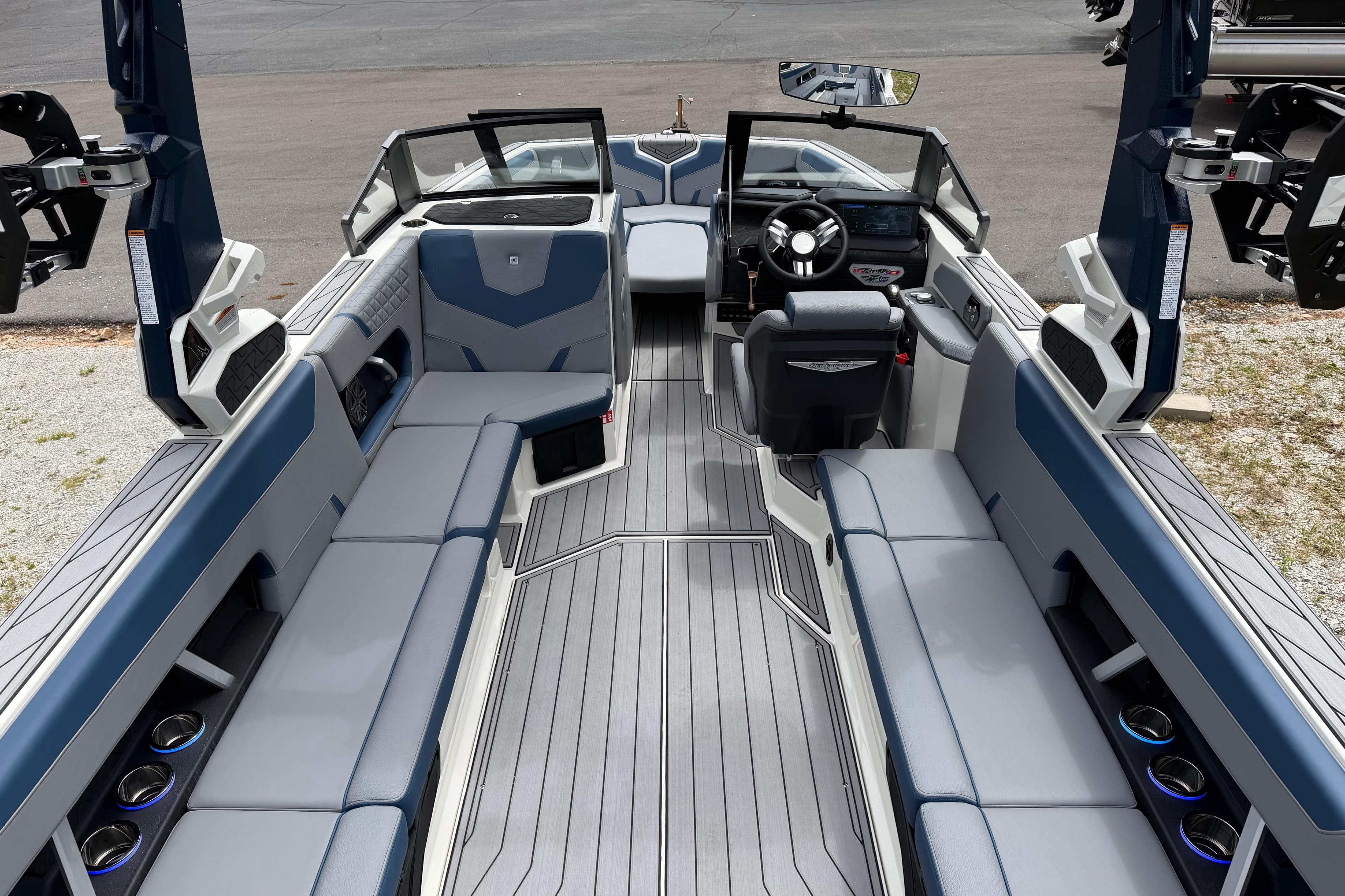 2026 Nautique Super Air Nautique GS24 interior with sleek seating and modern dashboard.