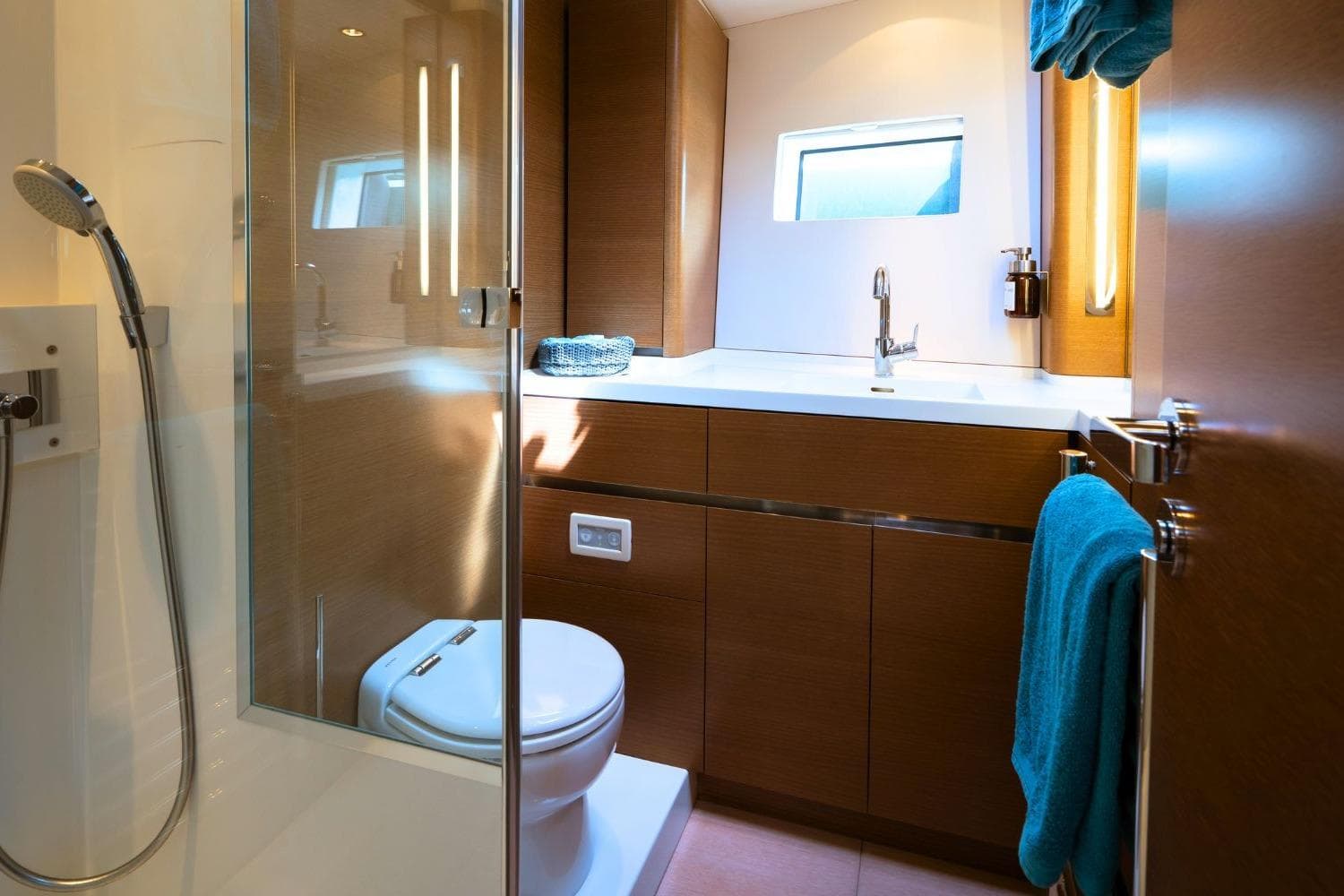 Luxurious bathroom interior of 2016 CNB 76 yacht with modern fixtures and elegant design.