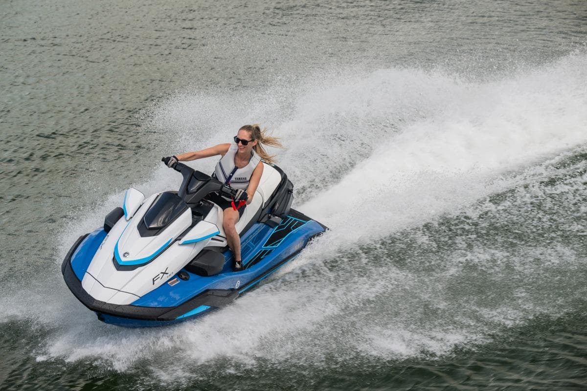 2026 Yamaha WaveRunner FX HO jet ski speeding on water with rider.