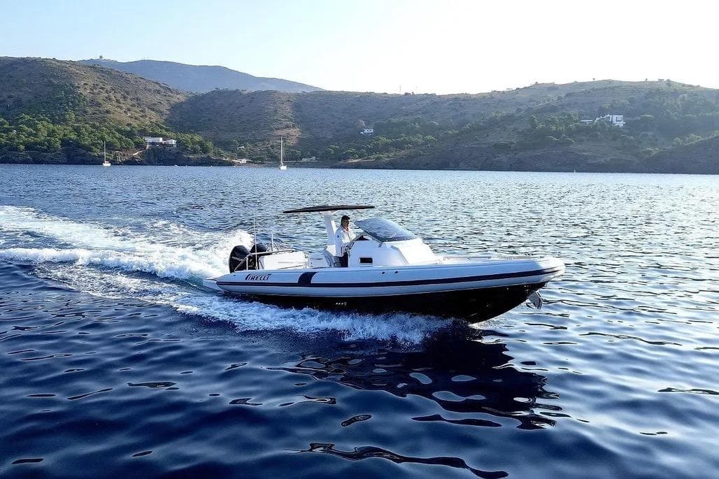 2026 Pirelli 30 boat cruising on scenic coastal waters.