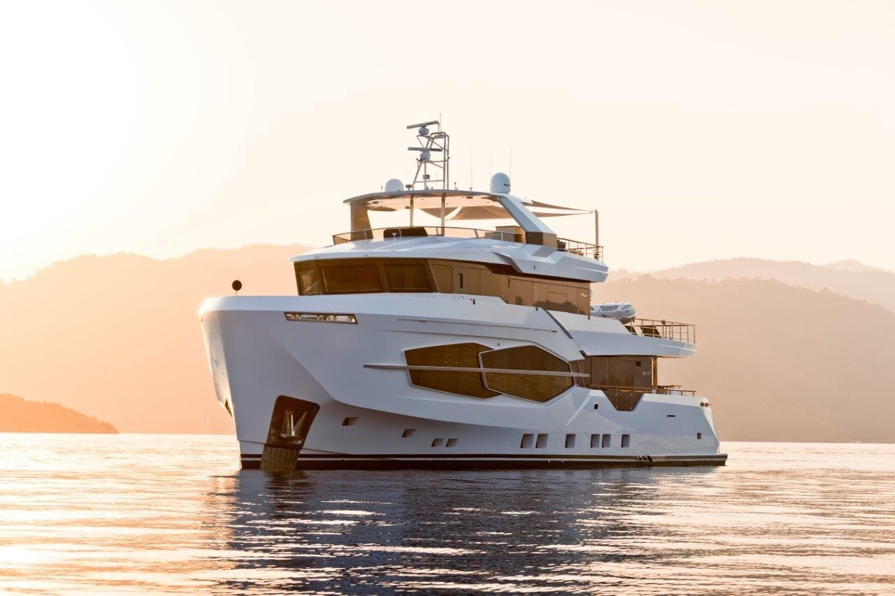 2025 Numarine 32XP yacht cruising at sunset.