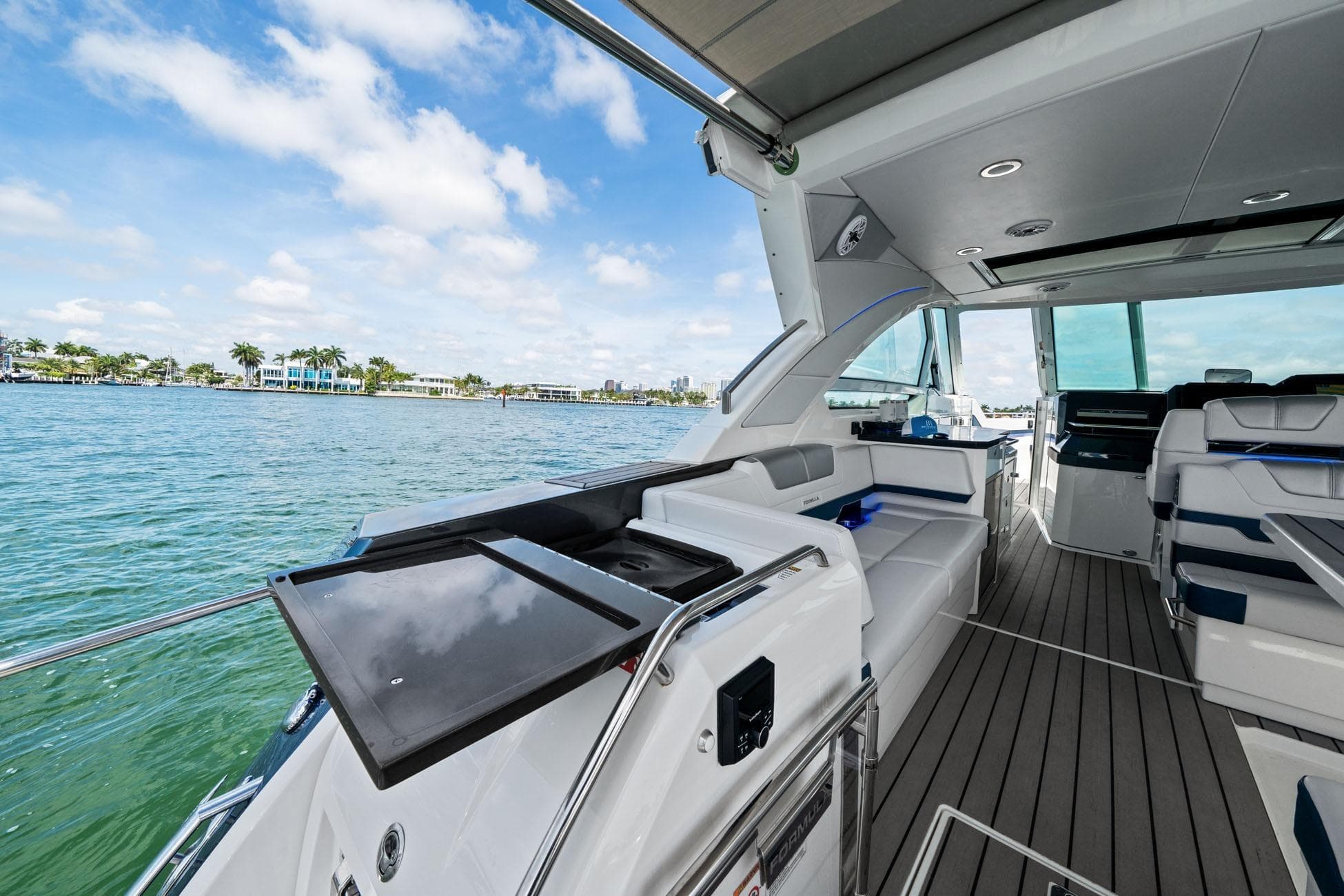 Luxurious interior of 2025 Formula 400 Super Sport Crossover yacht with scenic water view.