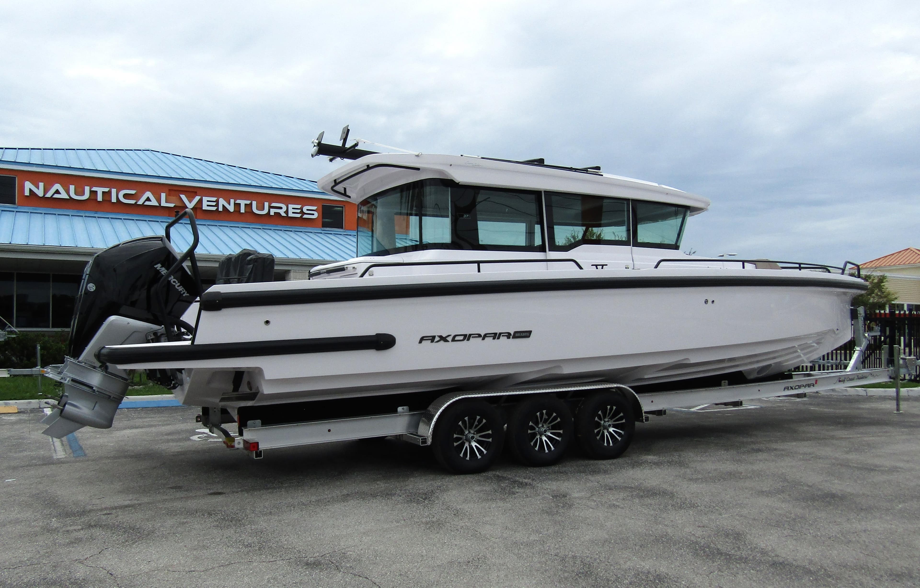 2024 Axopar 37XC CROSS CABIN boat on trailer at Nautical Ventures.