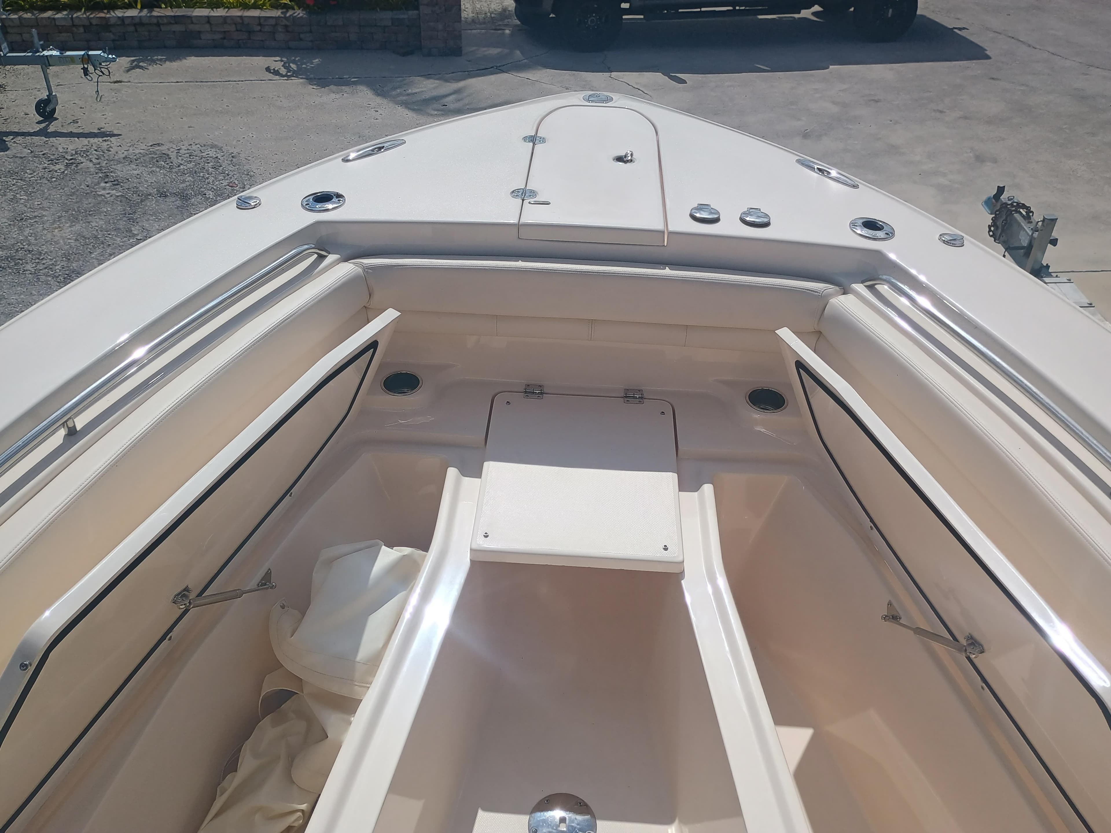2025 Grady-White Canyon 306 boat interior with storage compartments and seating.