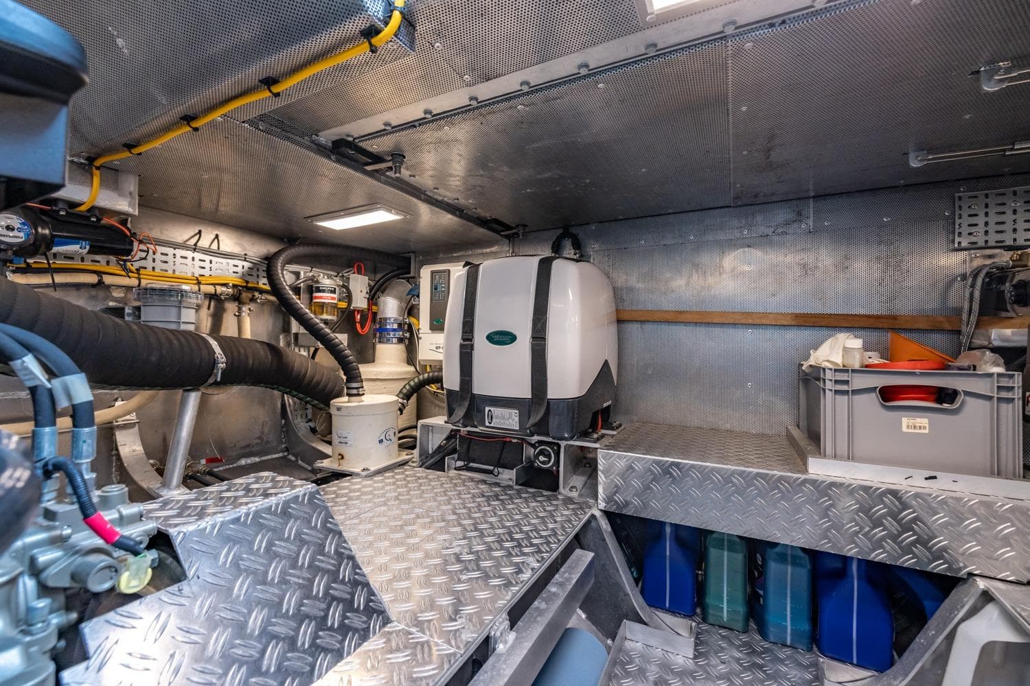 Engine room of 2016 Explorer NG 50 Alu Fast Going yacht, featuring advanced equipment and storage.