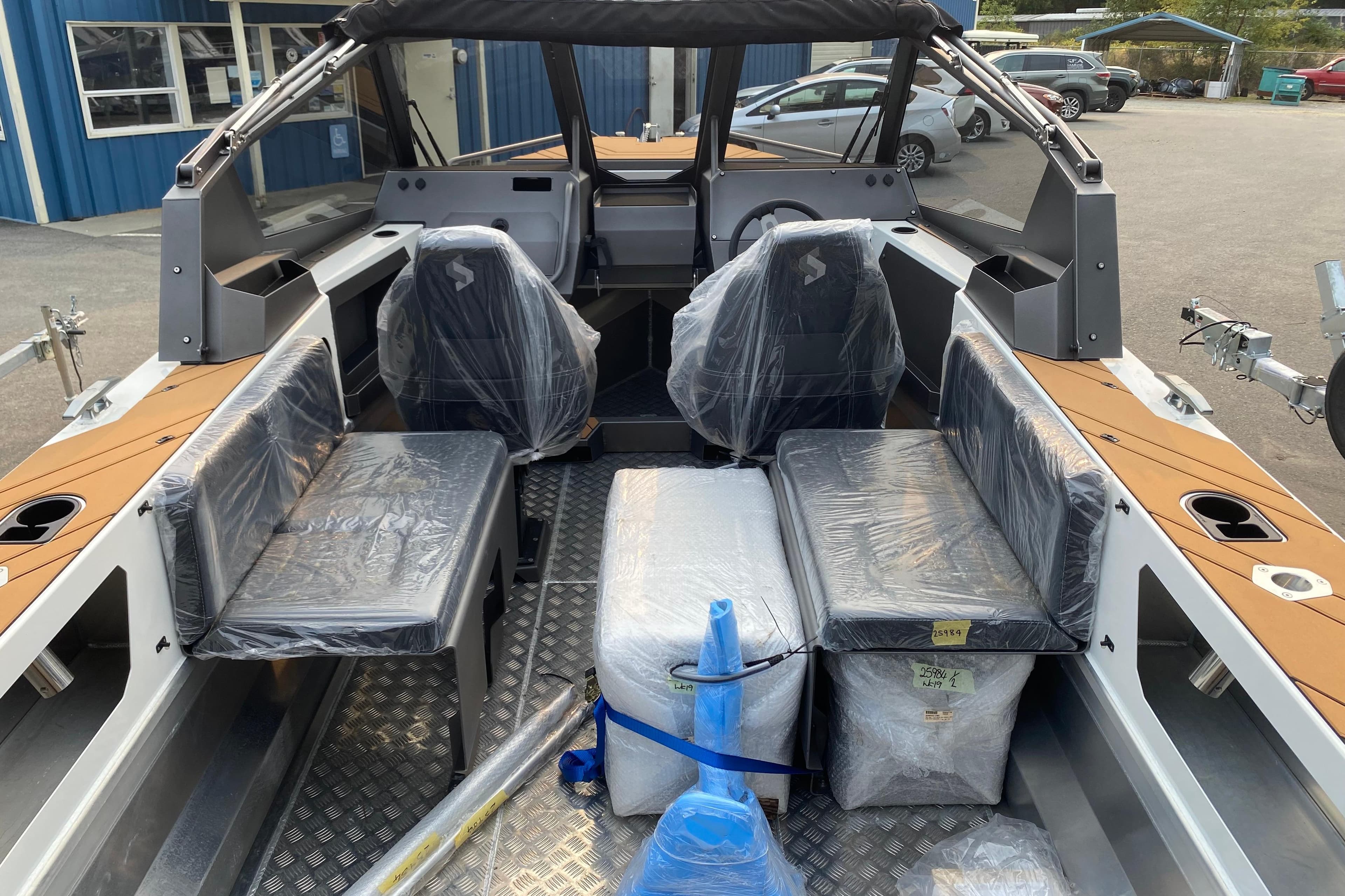 2026 Stabicraft 2050 Trekker boat interior with covered seats and modern design.