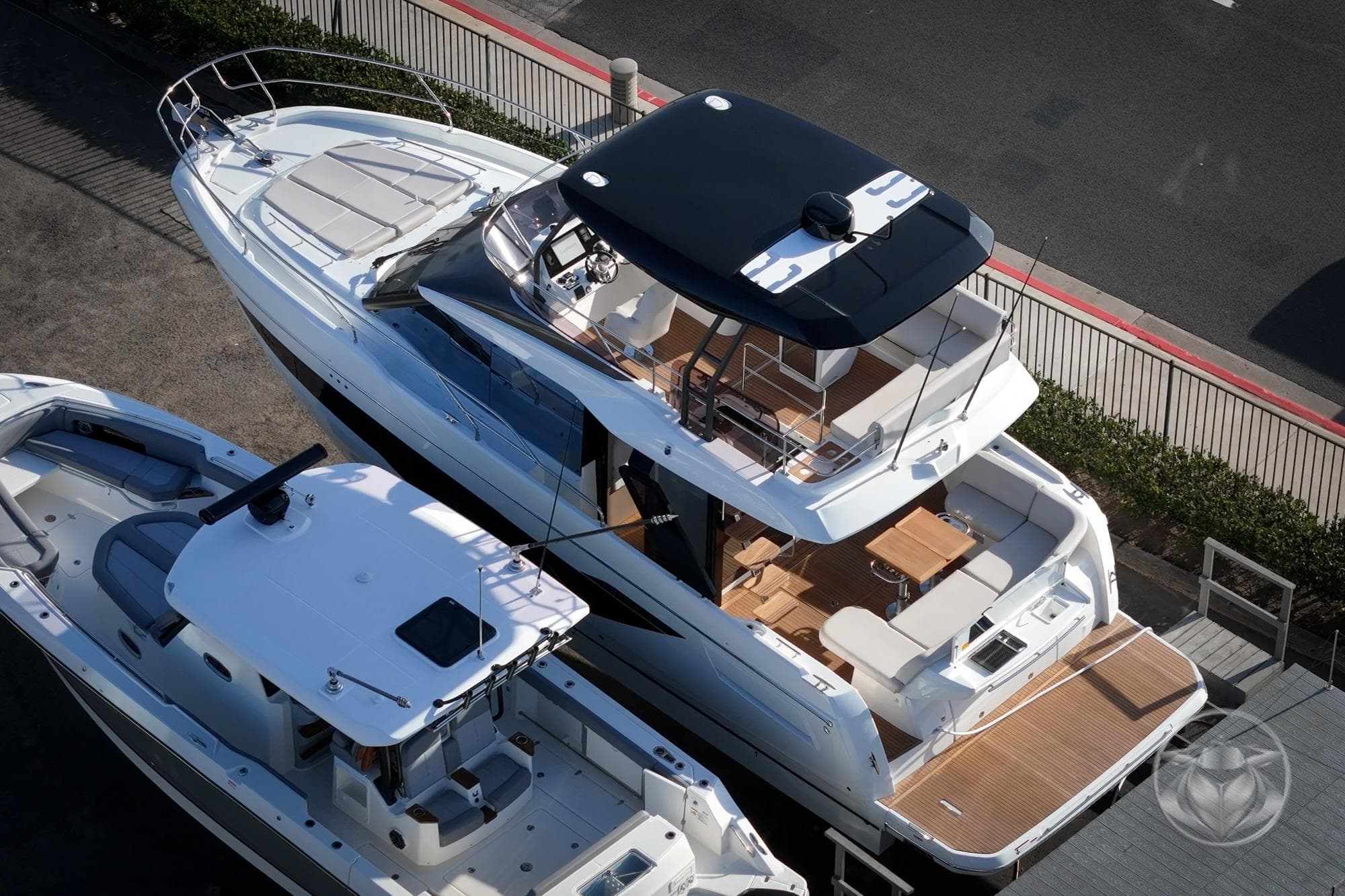 2026 Prestige F4.3 yacht, aerial view, docked with spacious deck and modern design.