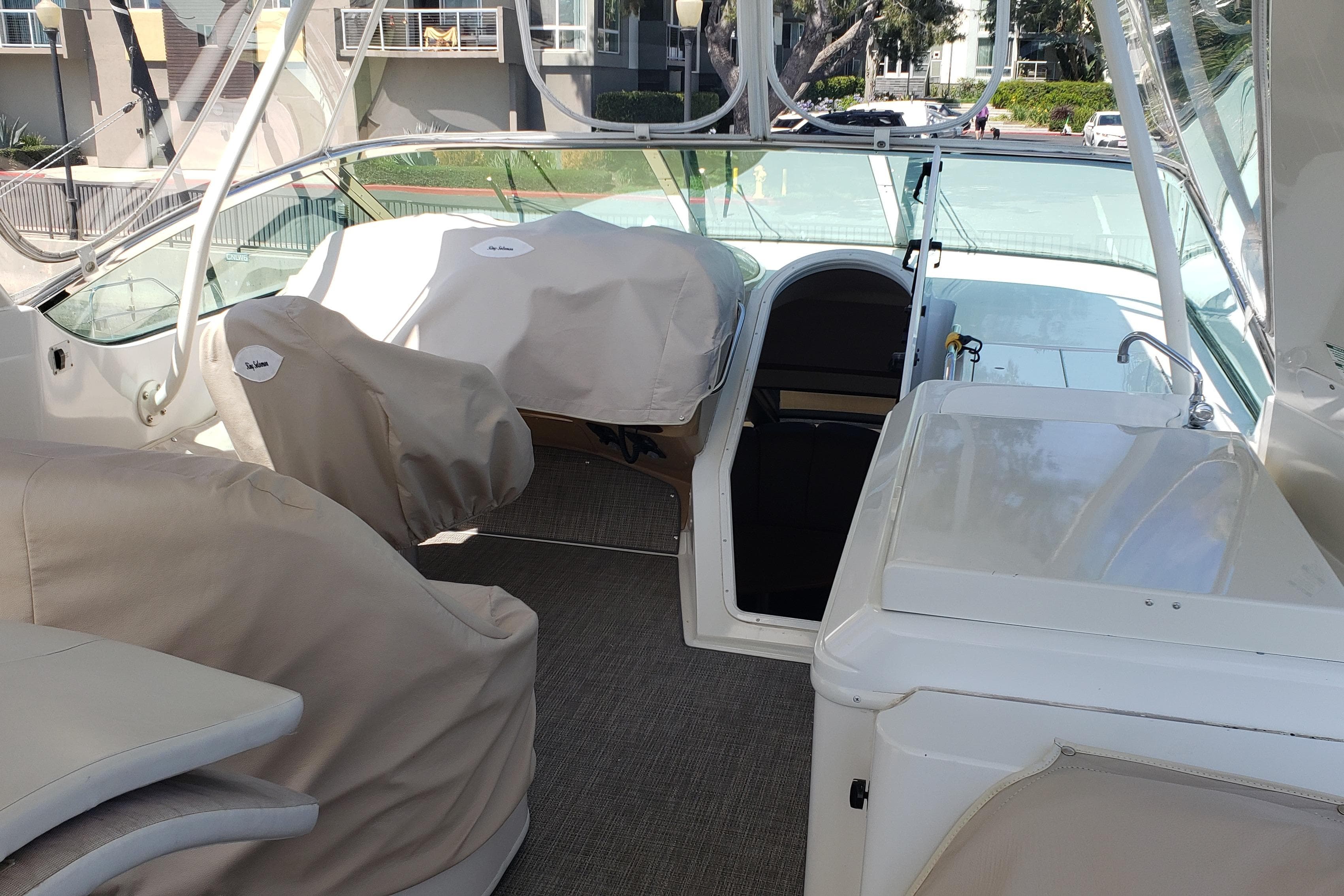 Interior view of a 2002 Carver 570 Voyager Pilothouse yacht with covered seating.