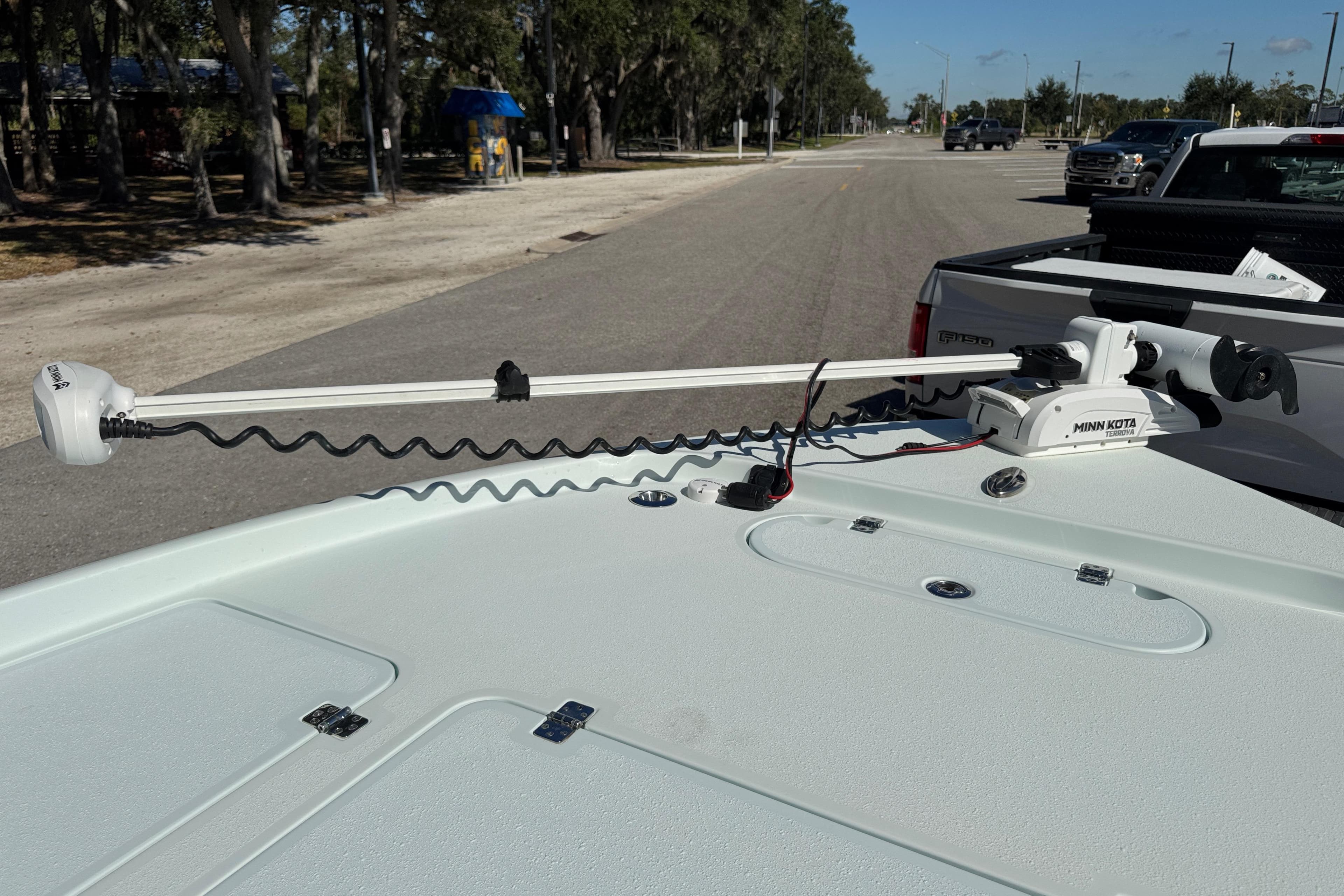2017 Yellowfin 24 Bay CE boat with Minn Kota trolling motor on deck.