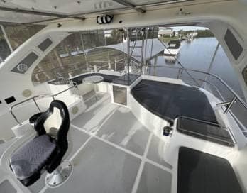 Luxurious 2017 Royal Cape Catamarans Majestic 53 yacht interior with spacious seating and helm.