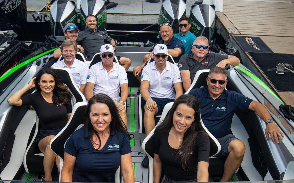 Group enjoying a ride on a 2025 Nor-Tech 4000 Supercat boat.