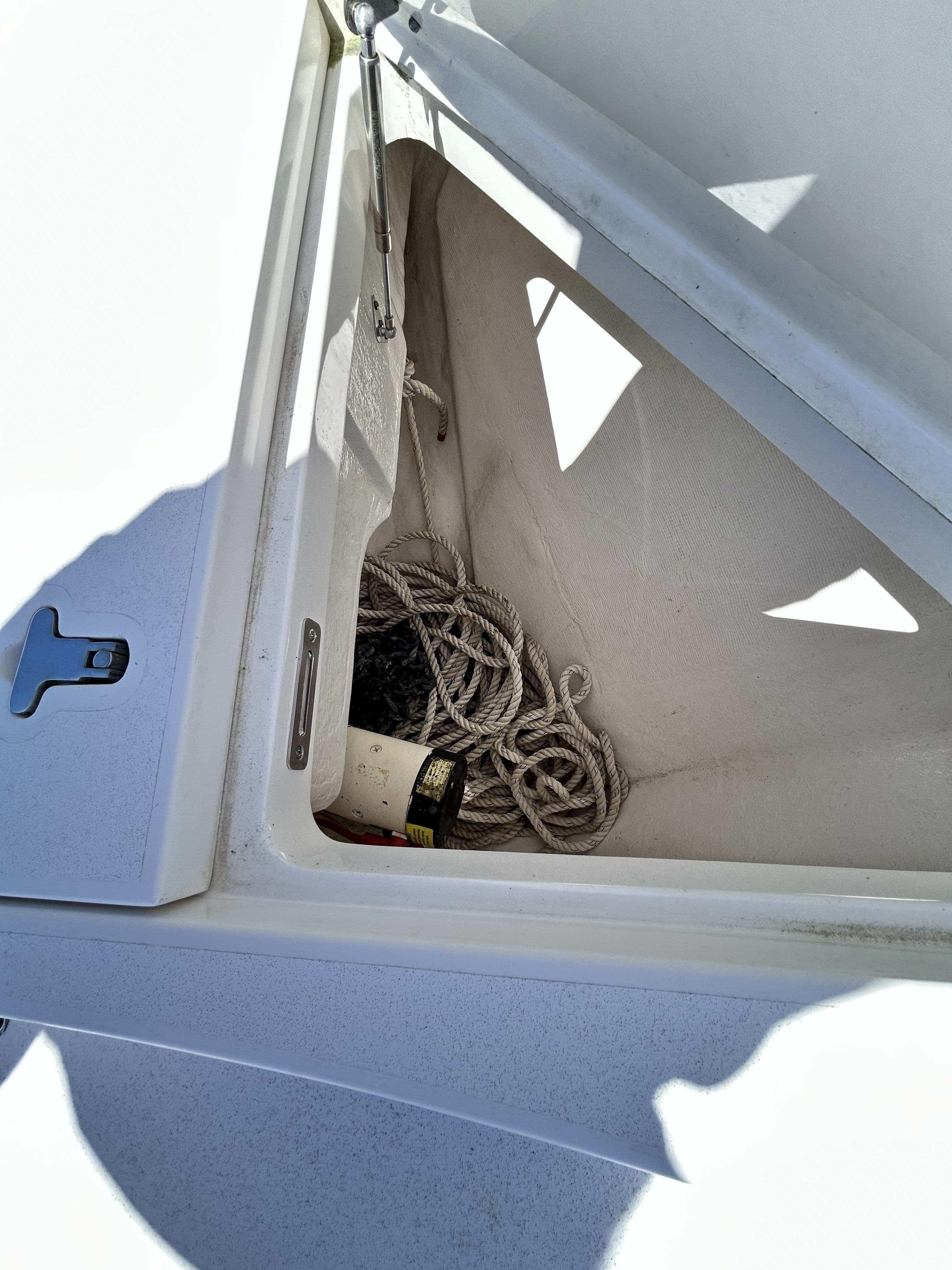 Anchor locker of 2018 Intrepid 475 Sport Yacht with rope.