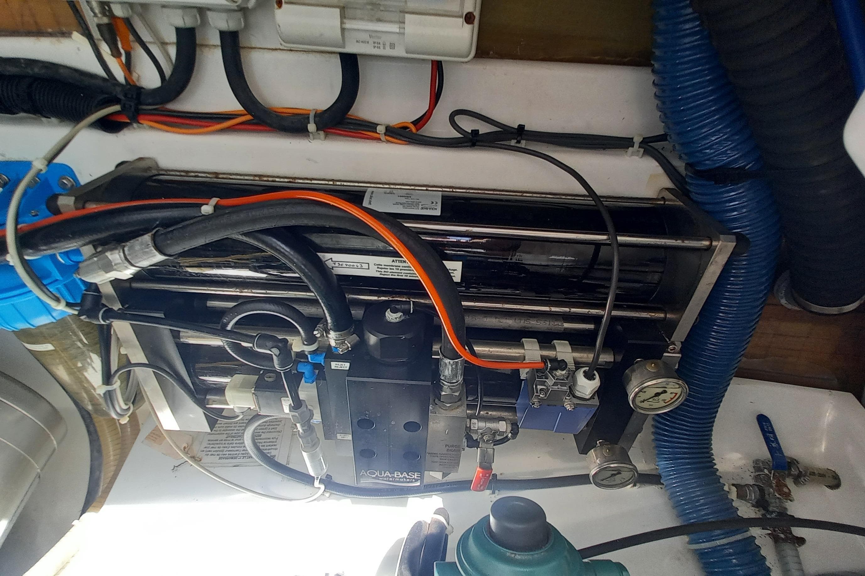 Engine room of a 2018 Fountaine Pajot Lucia 40 catamaran, showcasing mechanical components.