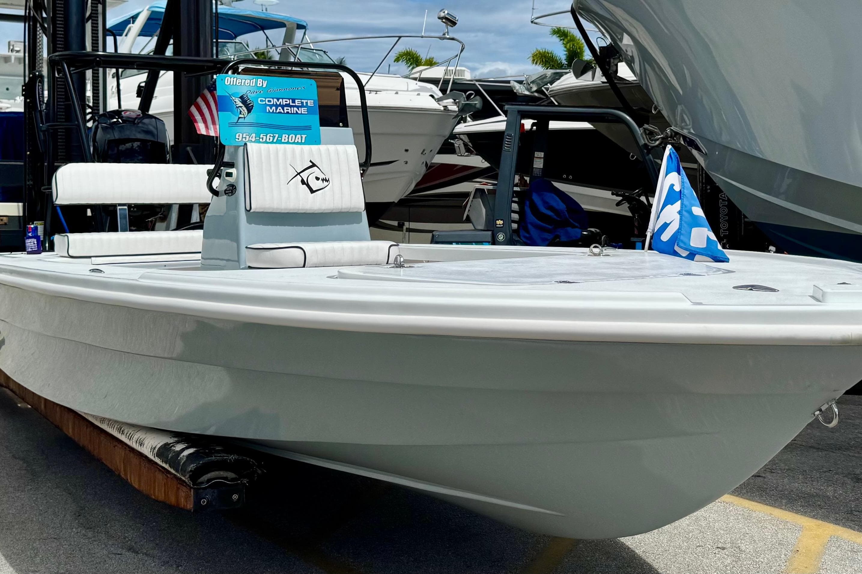 2026 Piranha B2000 boat displayed at a marina, featuring sleek design and modern amenities.