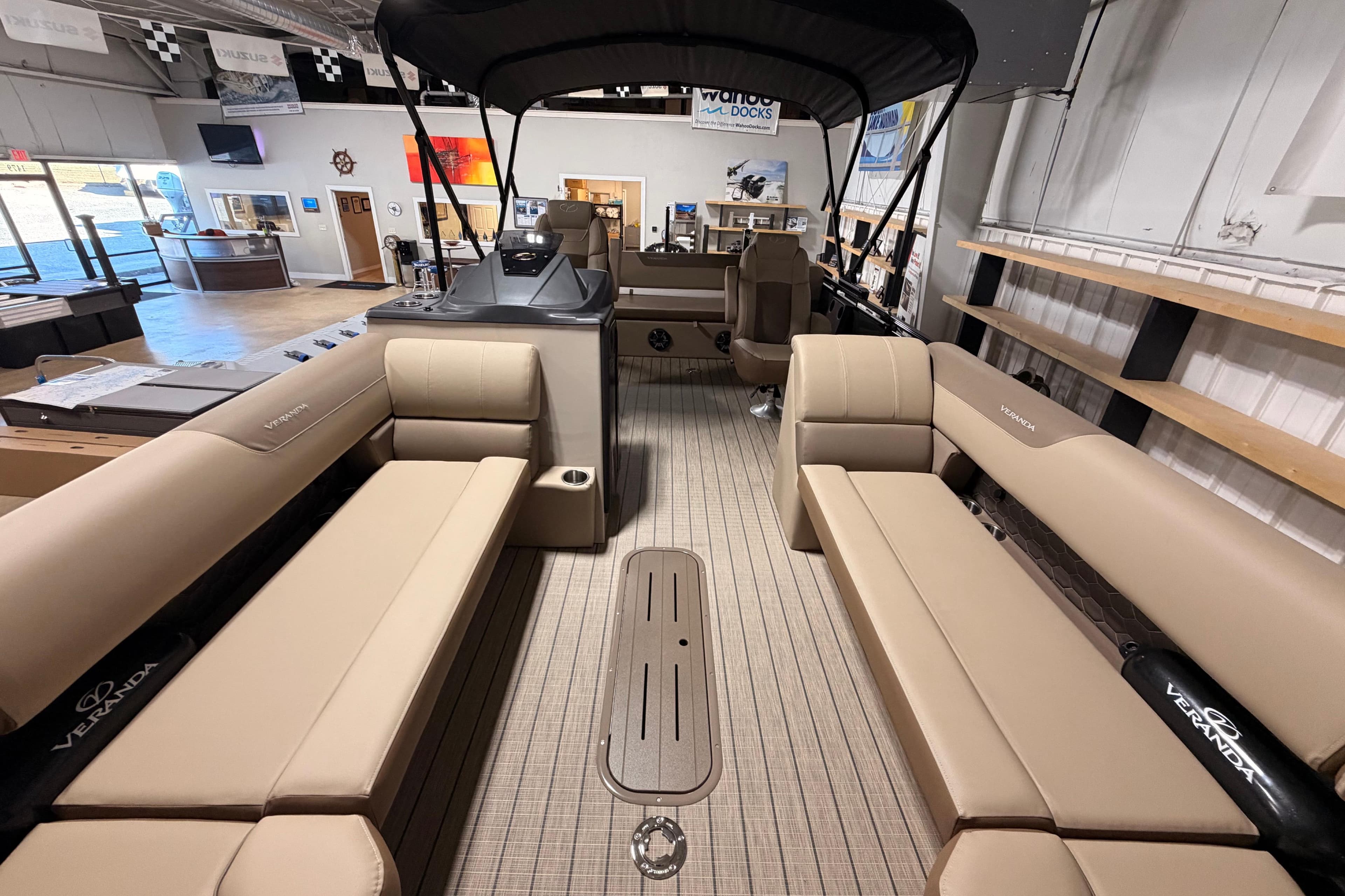 Interior view of 2026 Veranda VR 265 VL pontoon boat with beige seating.