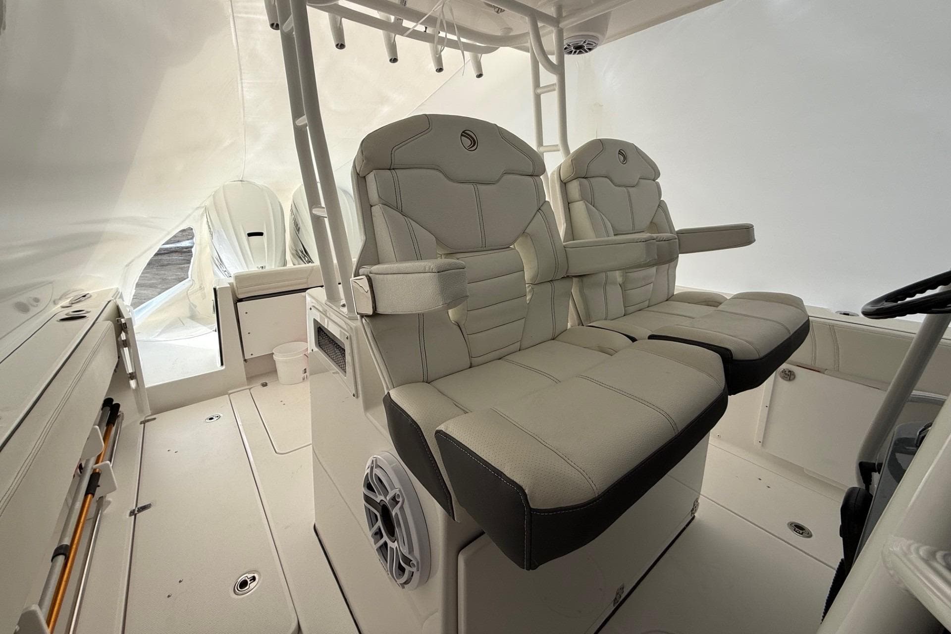 2023 Edgewater 340CC boat interior with plush seating and modern design.