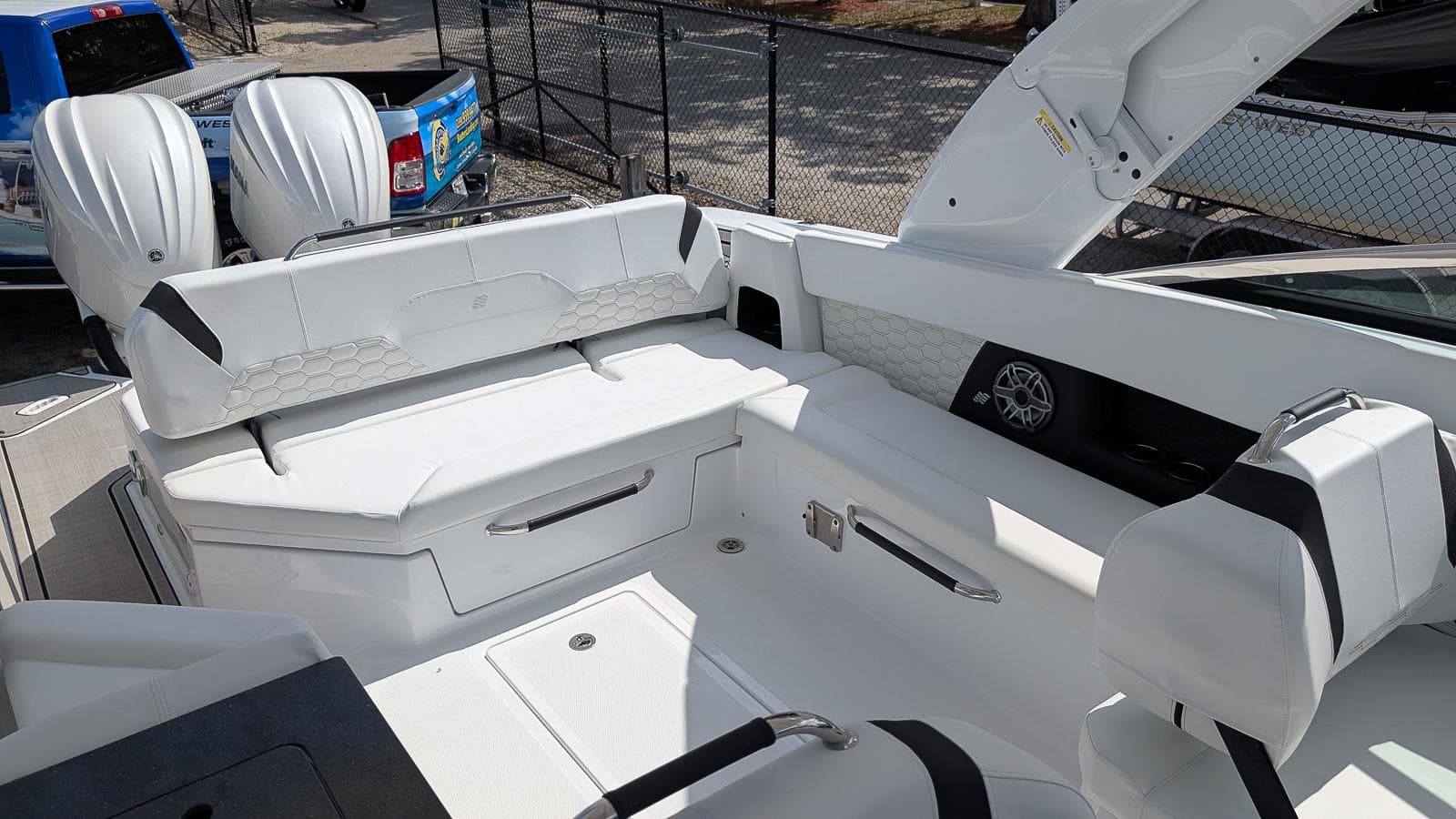 2025 Four Winns H9 boat interior with white seating and modern design.