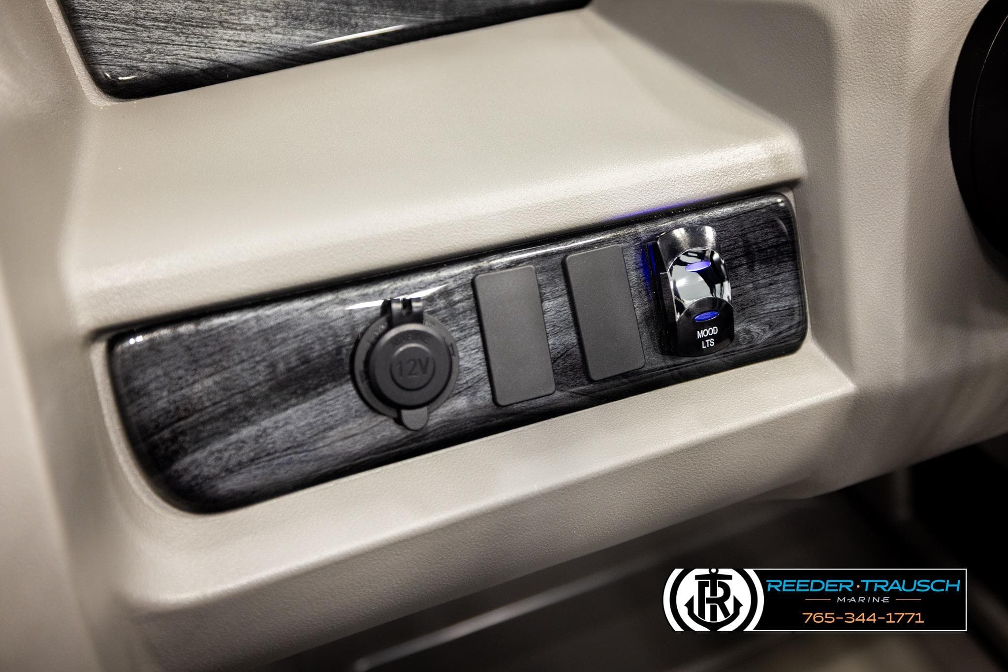 Control panel of 2026 Avalon LSZ Vrl with 12V socket and mood lights switch.